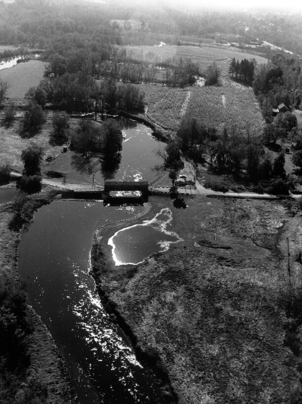 Aerial view of Covered Bridge, Housatonic River. This project is located at an historic covered bridge in Sheffield, one of two covered bridges located midway along the Housatonic River, Sheffield, MA.  Photo was taken Oct. 1987.