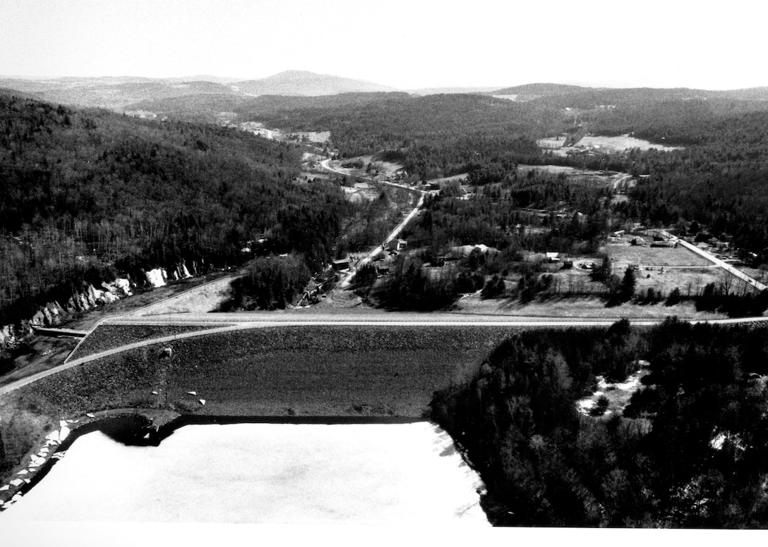 Aerial view of Wrightsville Reservoir. The dam at Wrightsville Reservoir in Montpelier is located on the North Branch of the Winooski River, about 40 miles southeast of Burlington, VT. From Montpelier, the dam is three miles north on Route 12. The project provides flood protection. Photo was taken in April 1990.