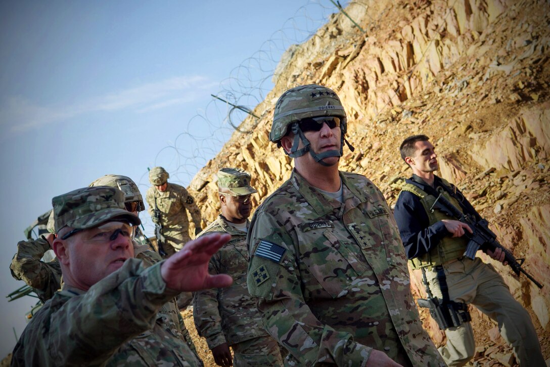 U.S. Army Col. Michael Getchell, left, briefs U.S. Army Chief of Staff ...