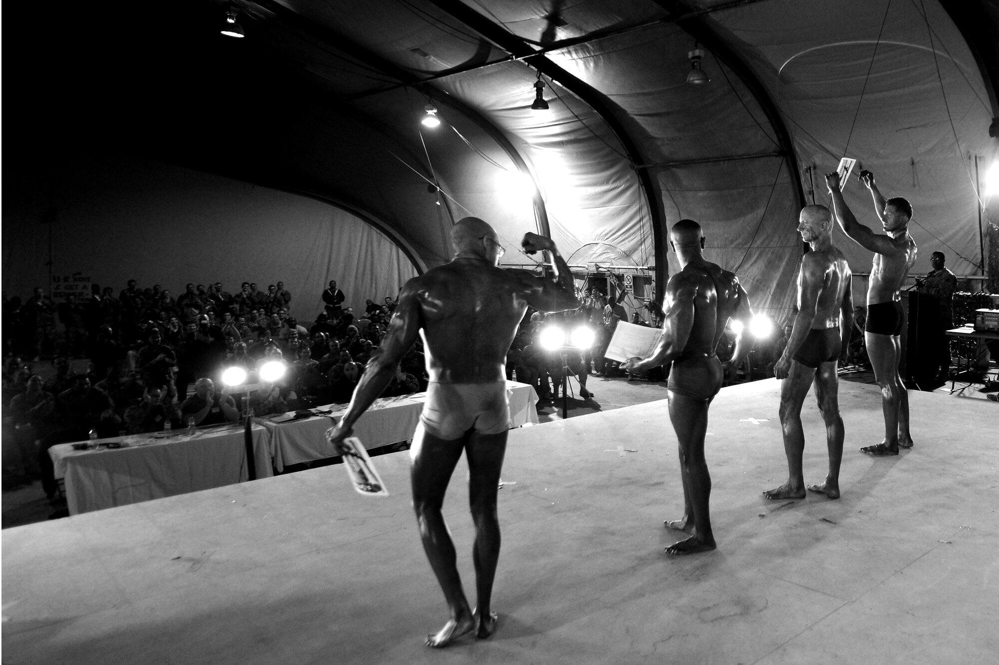 Airmen got a chance to show off their hard work and dedication to fitness as they participated in a bodybuilding competition at Bagram Airfield, Afghanistan, Feb. 16, 2013. The competition was open to all servicemembers and civilians located on BAF.  (U.S. Air Force photo/Senior Airman Chris Willis)