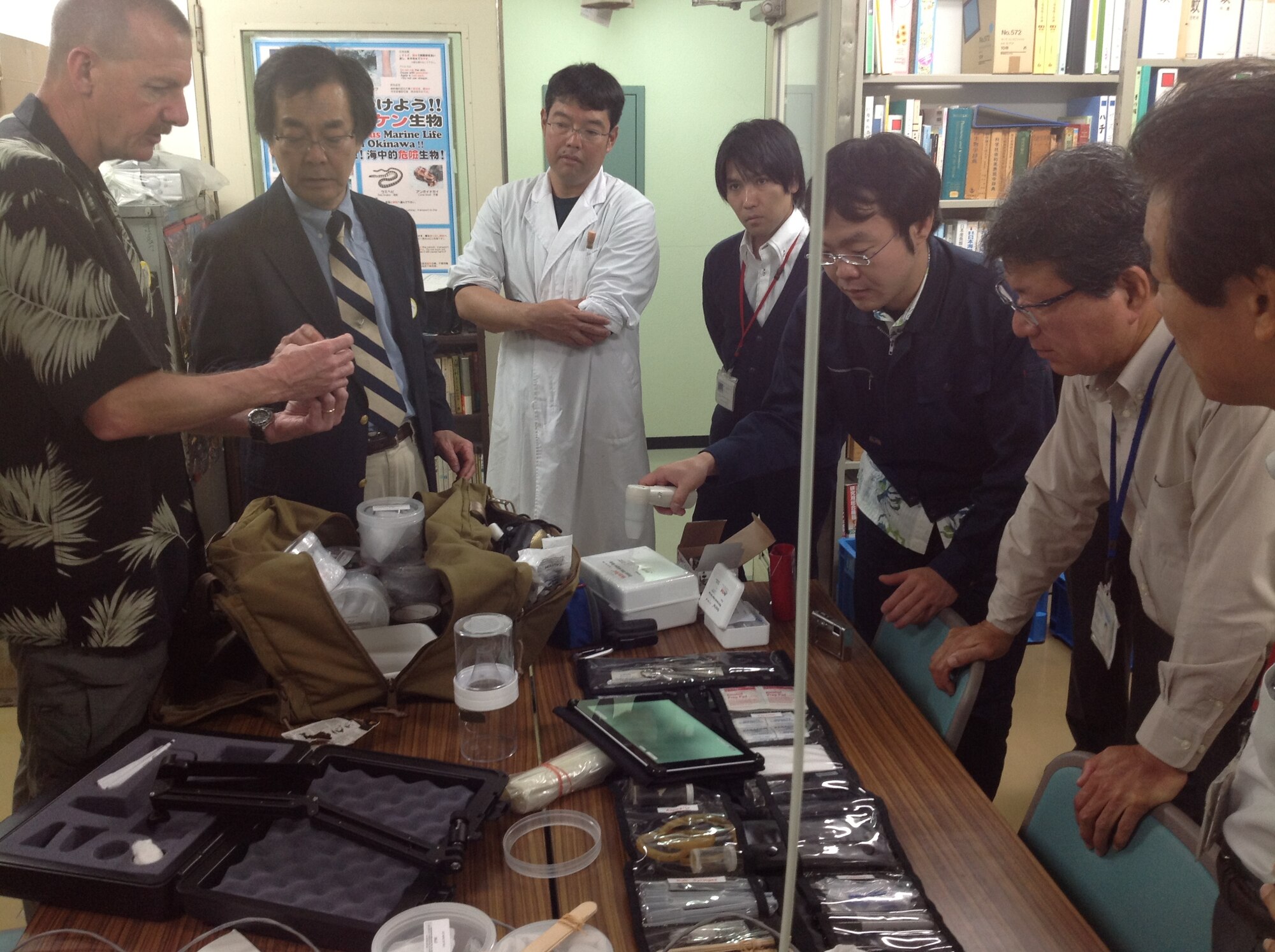 U.S. Air Force Maj. Wes Walker, U.S. Air Force School of Aerospace Medicine medical entomologist, meets with Okinawa Prefectural Government laboratory staff to discuss insect and disease surveillance, Feb. 19, 2013. Partnerships like this strengthen U.S.-Japan relations and help prevent disease outbreaks that could harm DoD personnel and their families. (U.S. Air Force photo/Lt. Col Joseph Silvers)