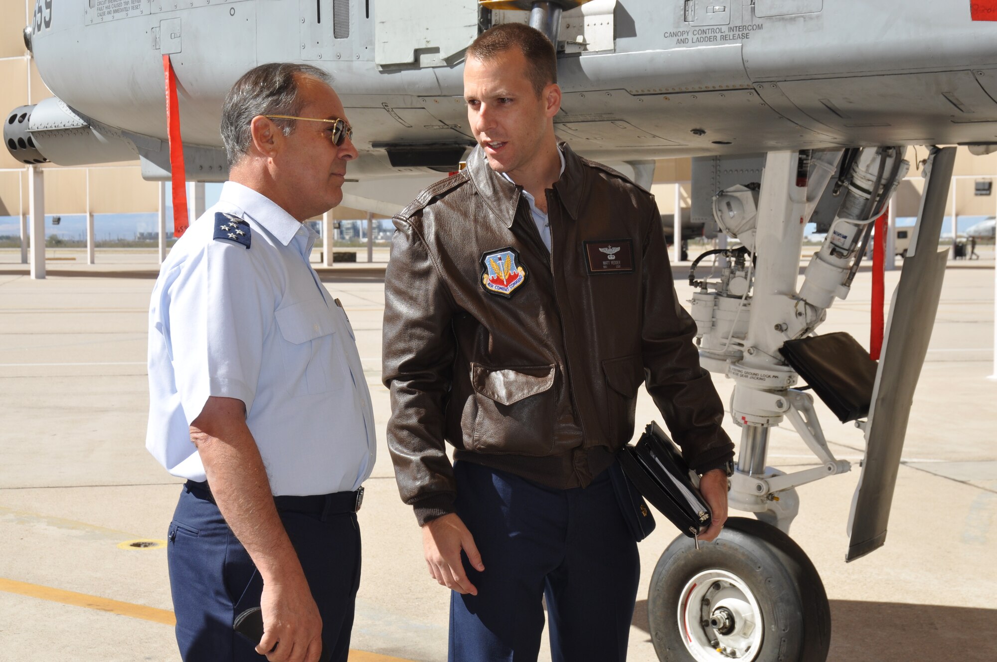 Maj. Matthew Vedder, 12th Air Force (Air Forces Southern), briefs Gen. Jorge Rojas, Commander in Chief, Chilean Air Force, on the capabilities of the A-10C Thunderbolt on Davis-Monthan AFB, Ariz., Feb. 25. General Rojas is visiting AFSOUTH to discuss bilateral relations and building partnerships during the Latin American Interoperability Workshop, Feb. 25 – 28. (U.S. Air Force photo by Master Sgt. Kelly Ogden/Released). 