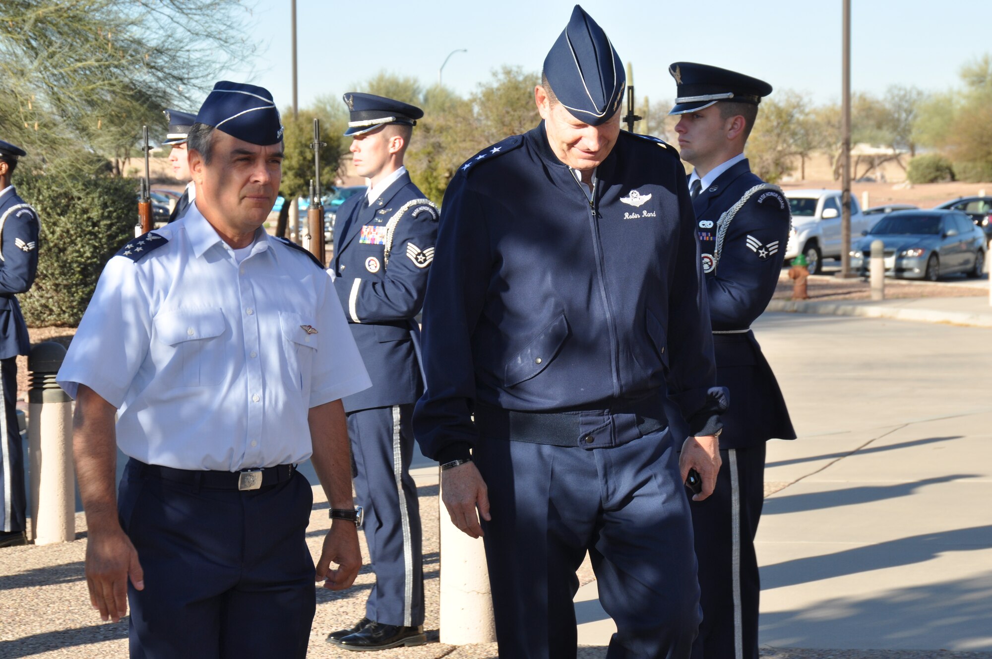 Gen. Jorge Rojas, Commander in Chief, Chilean Air Force, and Lt. Gen. Robin Rand, 12th Air Force (Air Forces Southern) commander, walk through an honor cordon at Davis-Monthan AFB, Ariz., Feb. 25. General Rojas is visiting AFSOUTH to discuss bilateral relations and building partnerships during the Latin American Interoperability Workshop, Feb. 25 – 28. (U.S. Air Force photo by Master Sgt. Kelly Ogden/Released). 