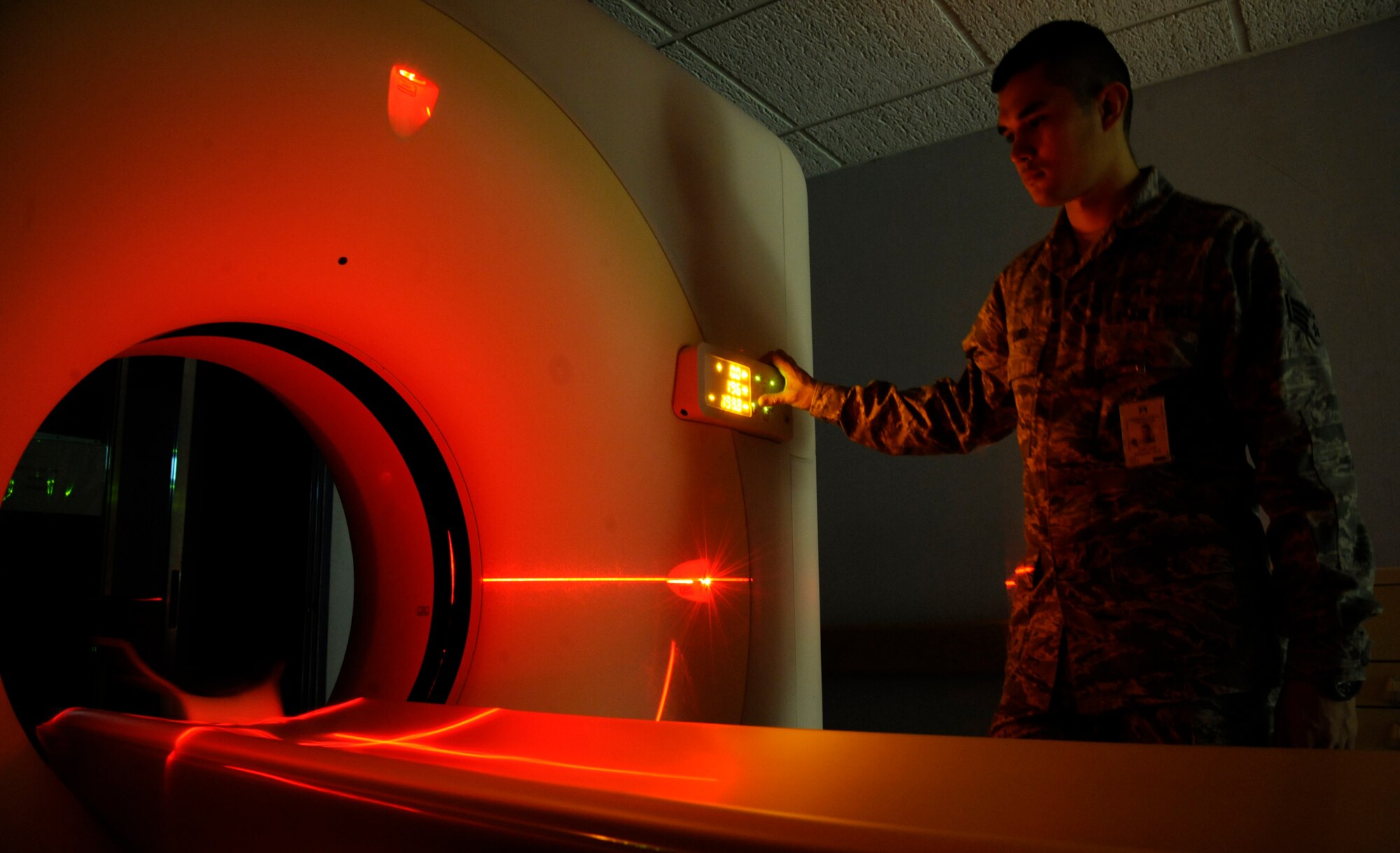 Senior Airman James Lord, 2nd Medical Group radiology technician, tests a Computed Tomography scanner at the radiology laboratory on Barksdale Air Force Base, La., Feb. 25. CT scanners provide an in-depth look into a patient's body, and are able to provide detailed images to doctor's to determine what may be wrong. (U.S. Air Force photo/Airman 1st Class Andrew Moua)