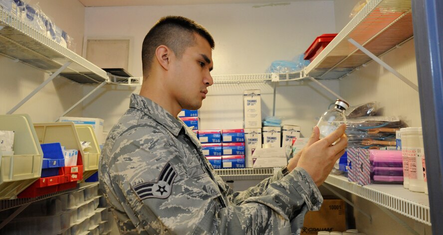 Senior Airman James Lord, 2nd Medical Group radiology technician, gathers supplies for a contrast Computed Tomography exam at the radiology laboratory on Barksdale Air Force Base, La., Feb. 25. During a contrast CT exam a solution is injected into a patient's body to highlight certain areas of the body, such as the circulatory system, and can help pick out blood clots or internal bleeding. (U.S. Air Force photo/Airman 1st Class Andrew Moua)