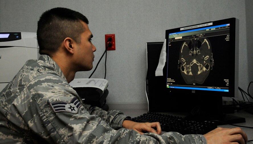 Senior Airman James Lord, 2nd Medical Group radiology technician, looks over images taken with a Computed Tomography scan at the radiology laboratory on Barksdale Air Force Base, La., Feb. 25. The images provide an in-depth look into a patient's head, and are able to provide detailed images to doctor's to determine what may be wrong. (U.S. Air Force photo/Airman 1st Class Andrew Moua)