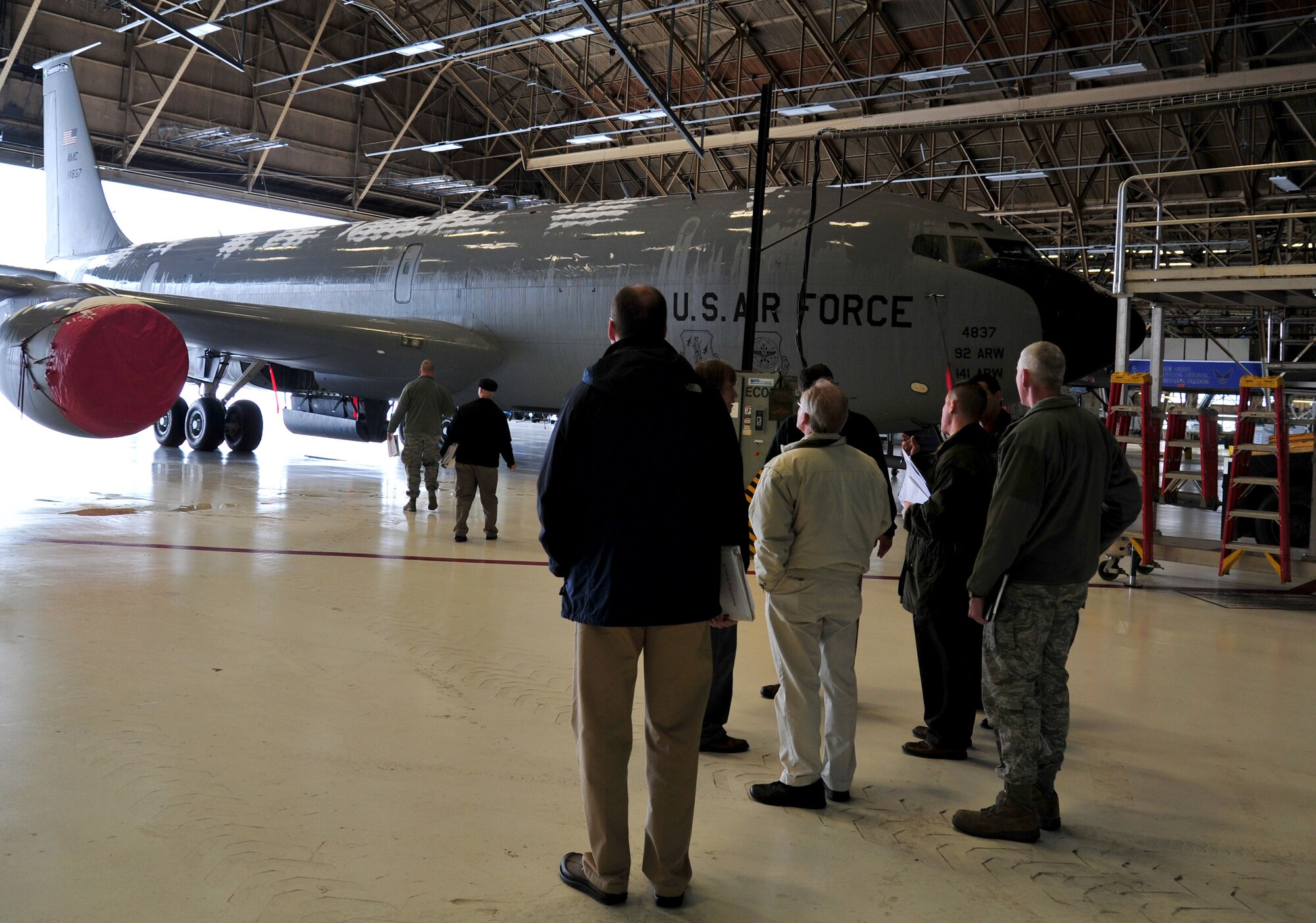 The KC-46A site survey team inspects a hanger on Fairchild Air Force Base, Wash., Feb. 19, 2013. The team inspected areas of the base to create an unbiased report to determine which of four bases would be selected to fly the new KC-46A refueling tanker. The KC-46A will be built by the Boeing Company and the first tankers are expected to fly in 2016. (U.S. Air Force photo by Senior Airman Taylor Curry)