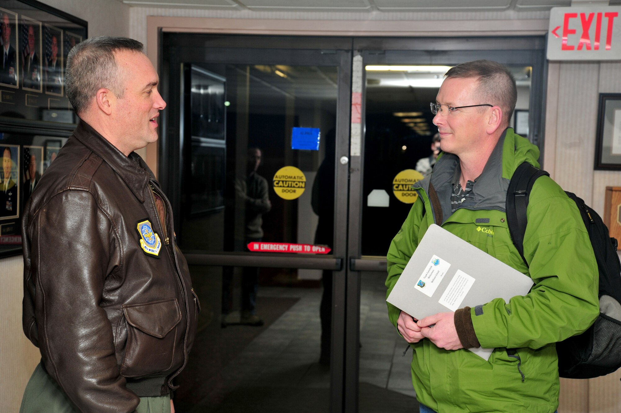 Col. Brian Newberry, 92nd Air Refueling Wing commander, greets William Schell, a member of the KC-46A site survey team, at Fairchild Air Force Base, Wash., Feb. 18, 2013. Over a four day inspection, the team assessed locations against operational and training requirements, potential impacts to existing missions, housing, infrastructure, manpower, and developed cost estimates to determine how to potentially lodge the KC-46A at Fairchild. (U.S. Air Force photo by Senior Airman Taylor Curry)