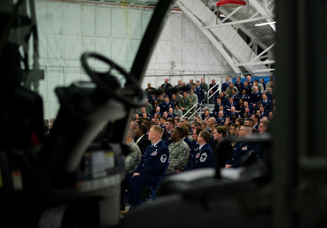 Airmen, family and friends attend a memorial service held for the late Senior Airman John E. King II, 89th Aerial Port Squadron aircraft services specialist, on Joint Base Andrews, Md., Feb. 22, 2013. King passed away while on duty Feb. 17, leaving behind his wife, Airman 1st Class Natalee King, and his son, John James King III. (U.S. Air Force photo/Staff Sgt. Perry Aston)