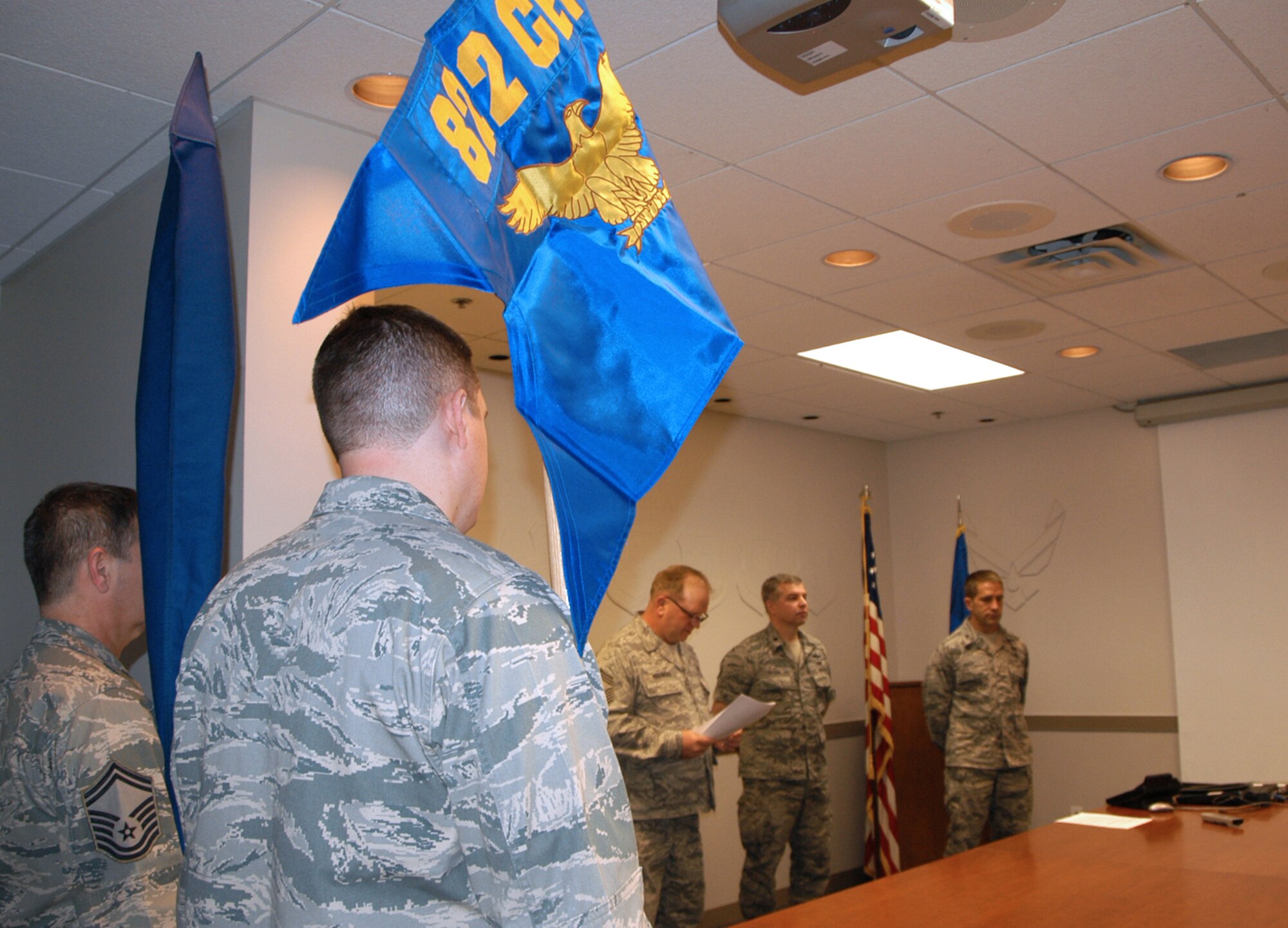 The recent historical activation ceremony for the 822nd Civil Engineer Flight was conducted in an unusual manner. The presiding officer was at Robins AFB, Ga., on speaker phone while the rest of the ceremony was being held at Naval Air Station Fort Worth Joint Reserve Base, Texas.