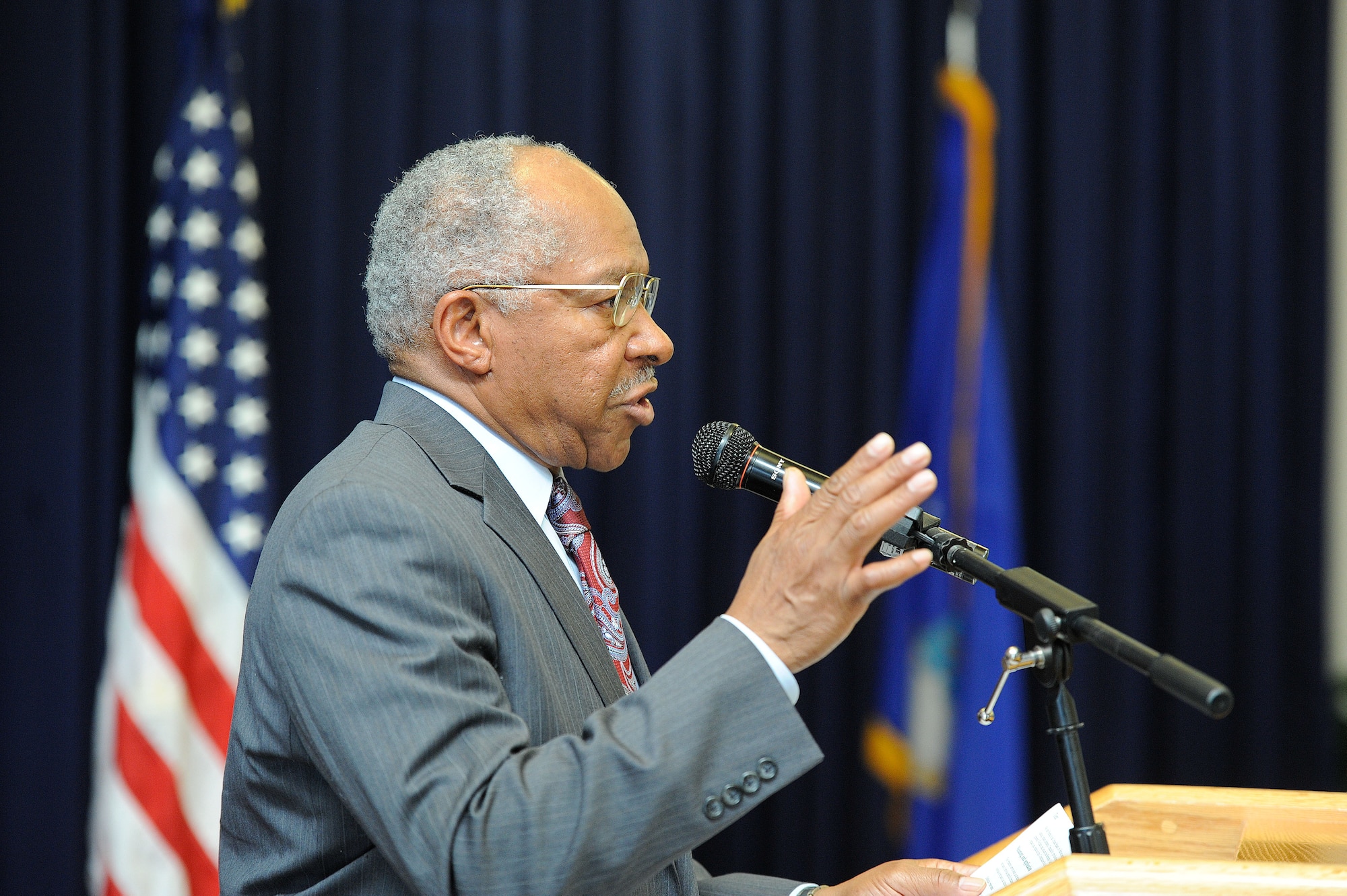 United States Air Force Colonel (Ret.) Norman A. McDaniel gives an inspriational speech at the Dover Air Force Base, Del. 2013 National Prayer Luncheon, Feb. 20, 2013. McDaniel is a former Vietnam-era Prison of War and spoke on how his faith allowed him to survive the POW camps of North Vietnam. (U.S. Air Force photo/Greg L. Davis)
