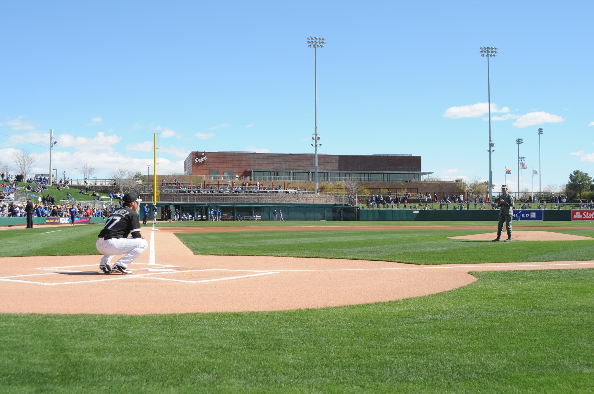 Col. Anne Gunter, commander, 944th Mission Support Group, threw out the first pitch during the Chicago White Sox opening Spring Training game Sunday at Camelback Ranch stadium in Glendale, Ariz. (U.S. Air Force photo/Maj. Elizabeth Magnusson) 
