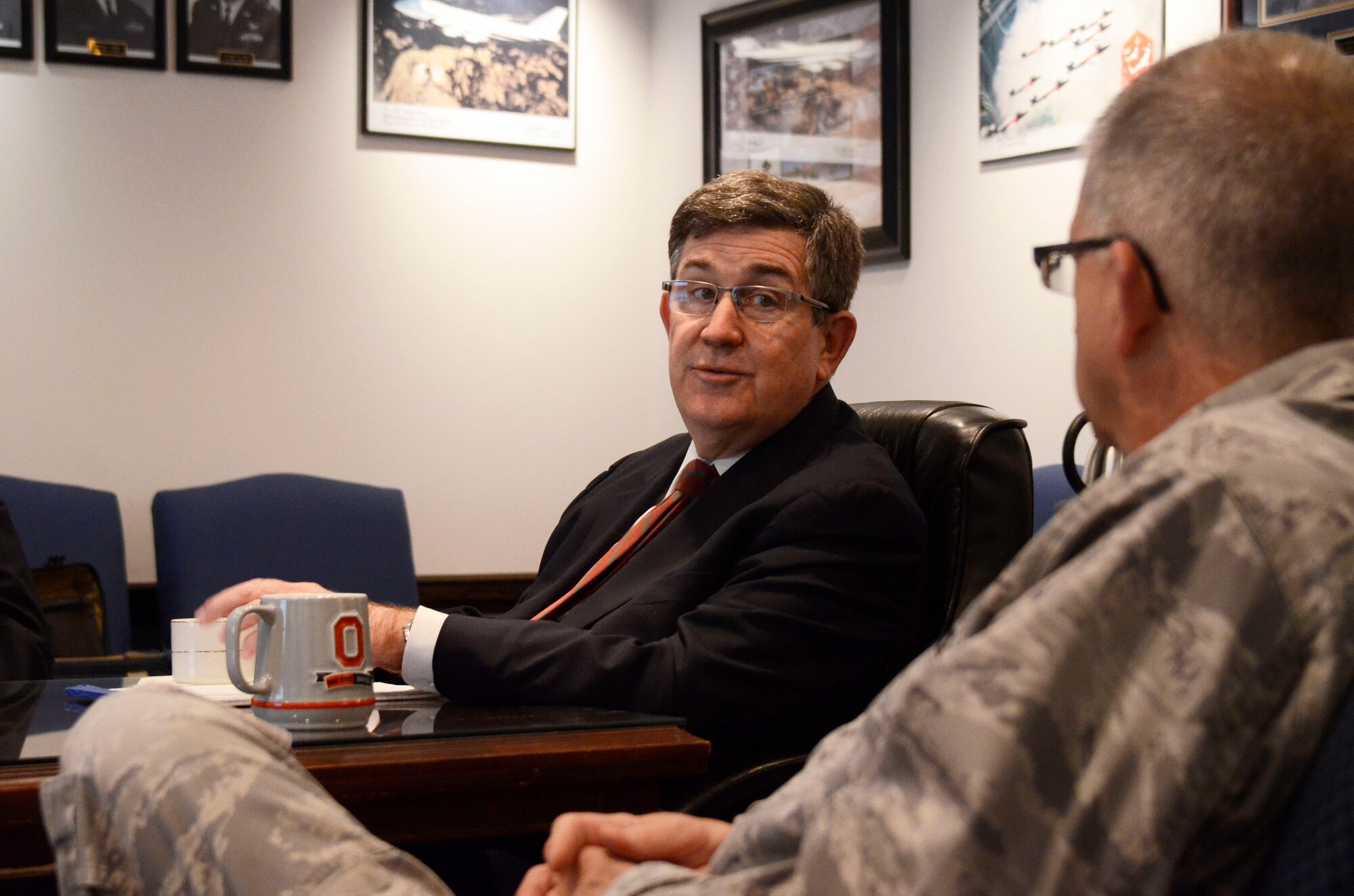 William L. Ball, Former United States Secretary of the Navy, speaks with Col. Tim E. Tarchick, 94th Airlift Wing commander, during a visit to Dobbins Air Reserve Base, Ga., Feb. 22. Ball was secretary from March 28, 1988 to May 15, 1989 serving under Presidents Ronald Reagan and George H.W. Bush. (U.S. Air Force photo/Don Peek)
