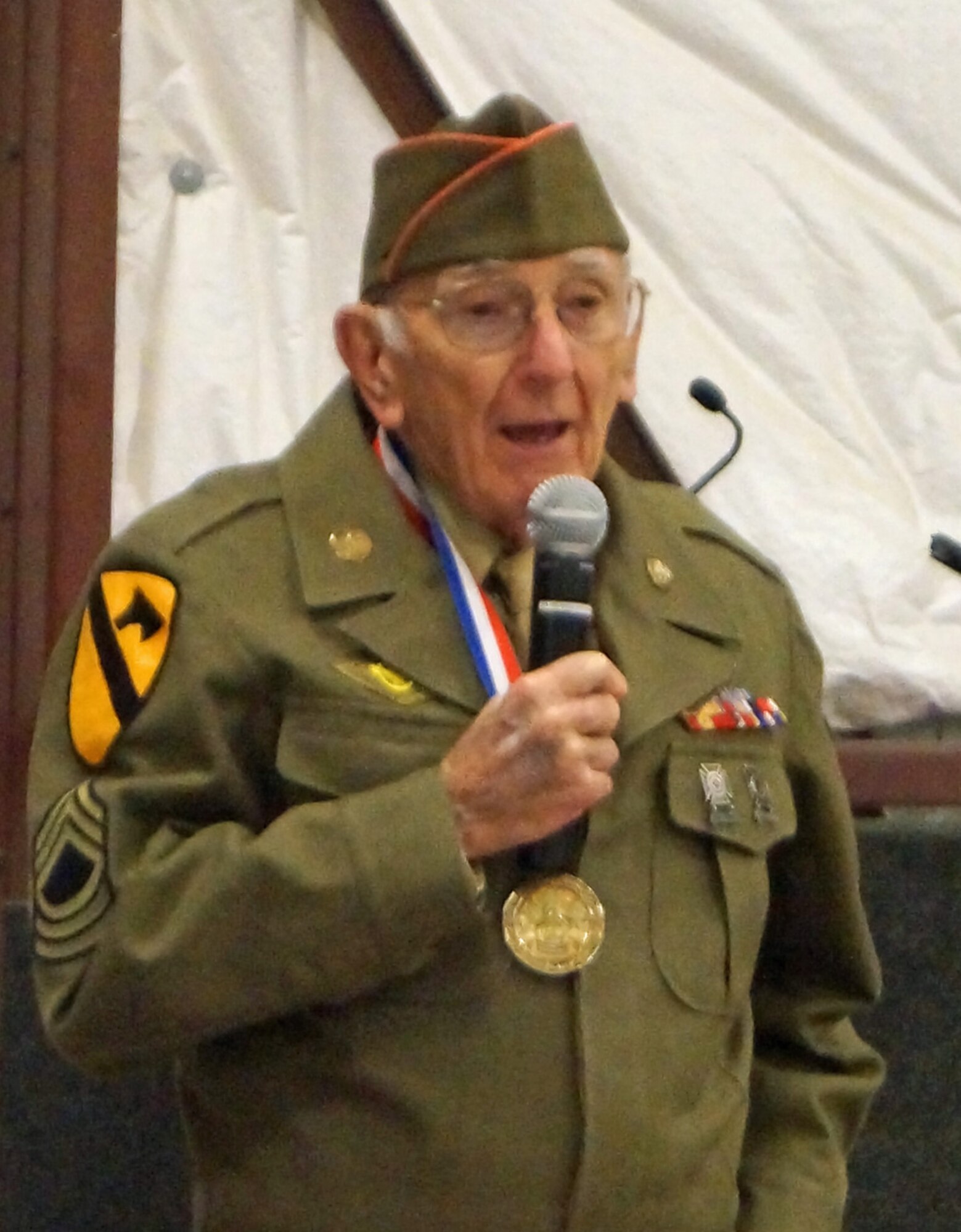 Jesse Boyde, a World War II veteran and Colorado Springs resident, speaks at a gathering honoring the spirit and sacrifice of World War II veterans at the National Museum of World War II Aviation in Colorado Springs, Colo., Feb. 2. The visit was coordinated by the museum and the Honor Flight of Southern Colorado. (Photo courtesy/Michelle Voss)