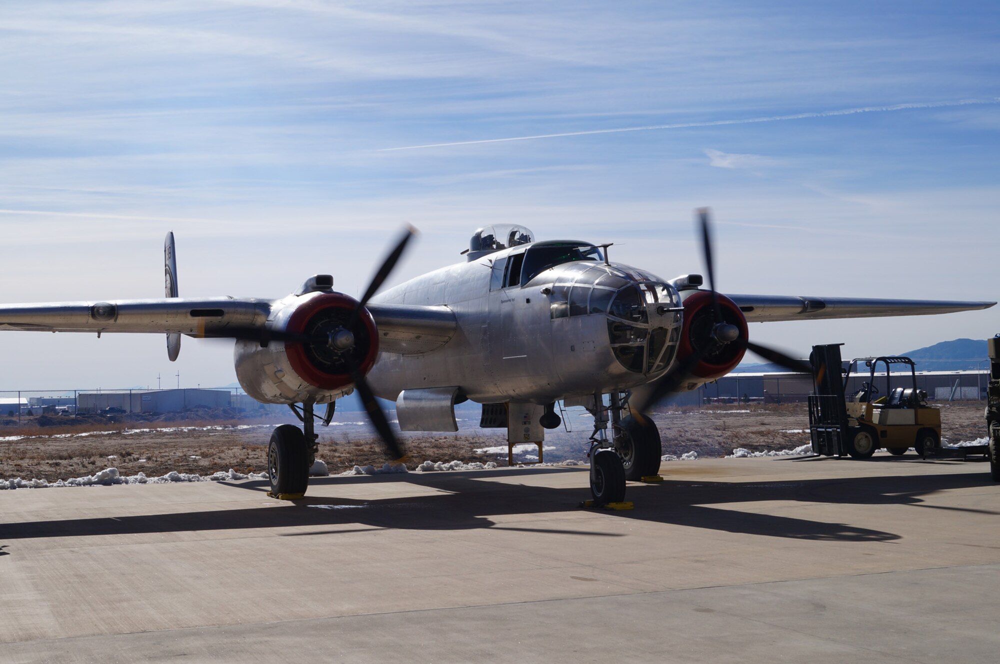 The engines of a World War II B-25, named “In the Mood,” run for an audience of World War II veterans, Airmen, and community members during a visit to the National Museum of World War II Aviation in Colorado Springs, Colo., Feb. 2. The visit was coordinated by the museum and the Honor Flight of Southern Colorado to honor the service and sacrifice of local World War II veterans. There were 14 local World War II veterans in attendance. (Photo courtesy/Michelle Voss)