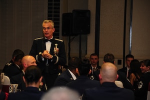 General Paul Selva, Air Mobility Command commander, speaks to Airmen Leadership graduates and audience at the ALS graduation ceremony at the Charleston Club, Feb. 14, 2013, at Joint Base Charleston - Air Base, S.C. Selva and Chief Master Sgt Richard  Kaiser, AMC command chief, were the guest speakers for the ceremony. 