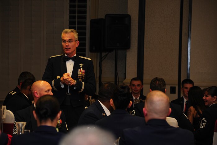 General Paul Selva, Air Mobility Command commander, speaks to Airmen Leadership graduates and audience at the ALS graduation ceremony at the Charleston Club, Feb. 14, 2013, at Joint Base Charleston - Air Base, S.C. Selva and Chief Master Sgt Richard  Kaiser, AMC command chief, were the guest speakers for the ceremony. 