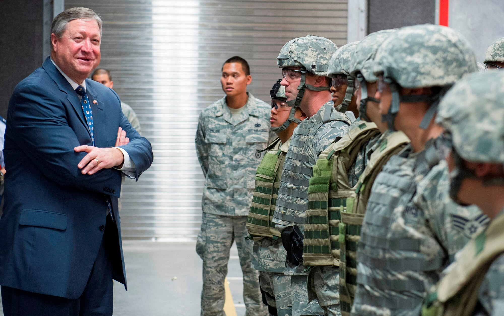 Secretary of the Air Force Michael Donley speaks with 45th Security Forces Squadron Airmen during their guard mount Feb. 21 as part of his visit to the 45th Space Wing, Patrick Air Force Base, Fla.  Donley also received a tour of the newly renovated Combat Arms Training Facility, where Airmen were completing 9mm pistol qualification training.  In addition to meeting with Airmen around the base, Donley had lunch with wing award winners, met with wing leadership and held an “Airman’s call” to discuss the latest challenges affecting the service. (U.S. Air Force Photo/Matthew Jurgens)