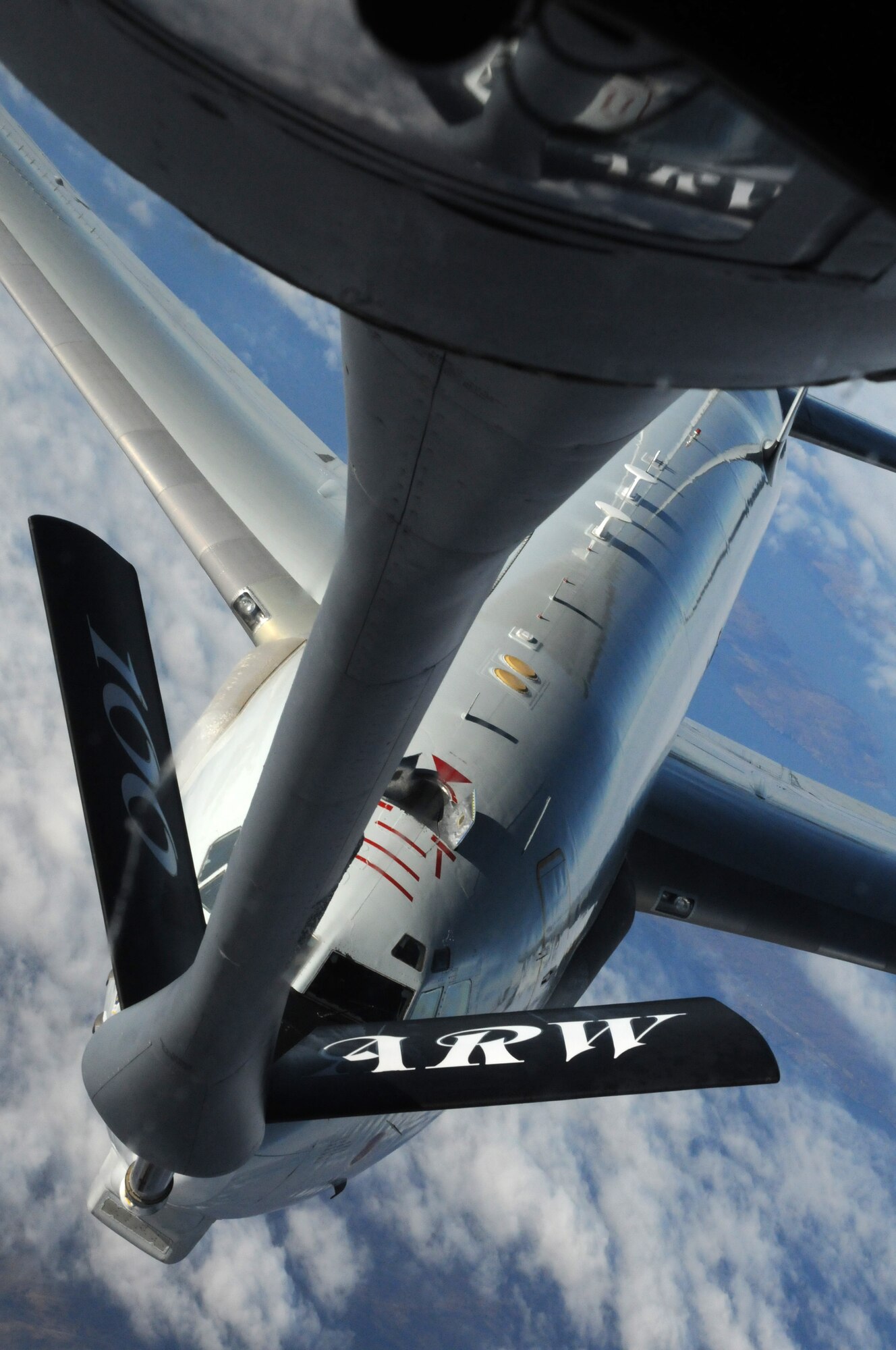 A KC-135 Stratotanker from the 100th Air Refueling Wing at RAF Mildenhall, England, prepares to offload approximately 60,000 pounds of fuel to an E-3 Sentry from Tinker Air Force Base, Okla., Feb. 22, 2013, during the E-3’s trans-Atlantic flight. The E-3 airborne warning and control system is capable of providing data analysis and real-time information of battle spaces to U.S. military commanders anywhere in the world. (U.S. Air Force photo by 1st Lt. Christopher Mesnard/Released)