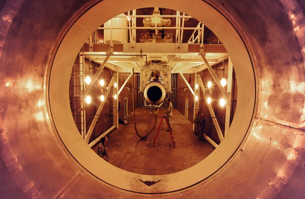 WHITEMAN AIR FORCE BASE, Mo. -- Airman 1st Class Lester Popham, 509th Maintenance Squadron aerospace propulsion apprentice, inspects the exhaust of a B-2 Spirit engine for foreign object debris and oil in the test cell, Feb. 13. A thorough inspection helps mechanics find items that might destroy the engine or the test cell. (U.S. Air Force photo/Staff Sgt. Nick Wilson) (Released) 