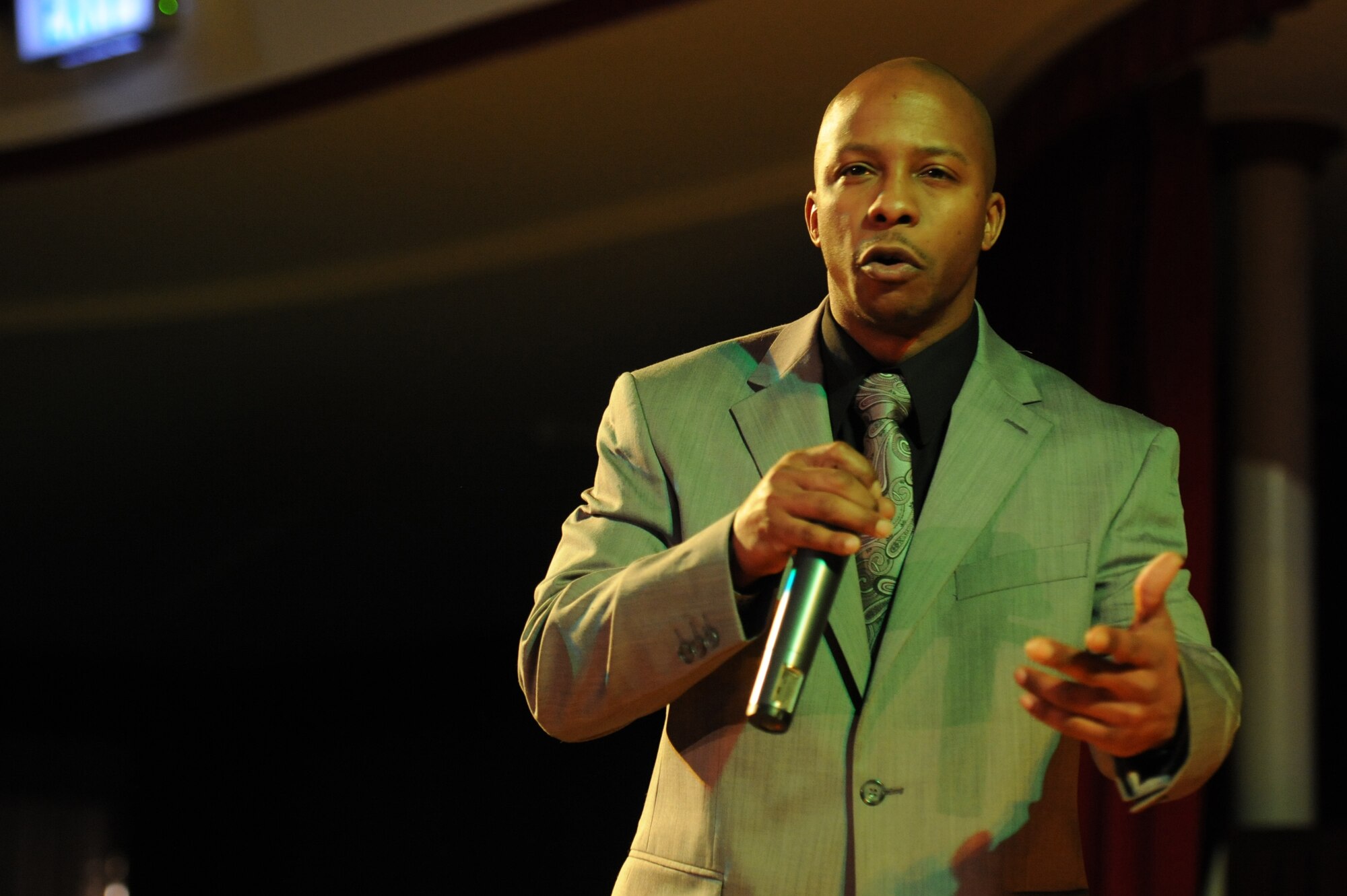 Kevin Rice, poet, performs during Apollo Night at the Armstrong Club on Vogelweh Military Complex, Germany, Feb. 23, 2013. Apollo Night in the Kaiserslautern Military Community traces its roots to the original event in Harlem New York, and gives members of the KMC a chance to do something out of the ordinary.  (U.S. Air Force photo/Senior Airman Aaron-Forrest Wainwright)