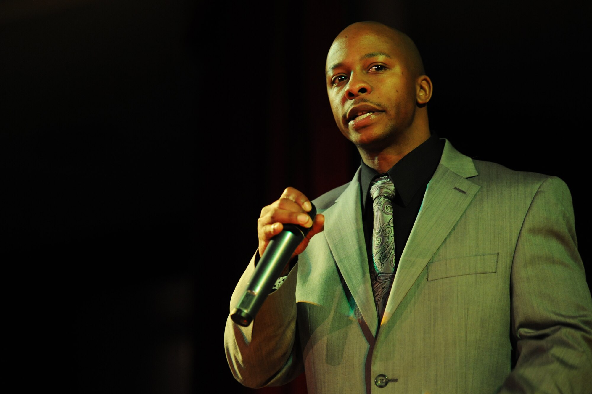 Kevin Rice, poet, performs during Apollo Night at the Armstrong Club on Vogelweh Military Complex, Germany, Feb. 23, 2013. Apollo Night in the Kaiserslautern Military Community traces its roots to the original event in Harlem New York, and gives members of the KMC a chance to do something out of the ordinary.  (U.S. Air Force photo/Senior Airman Aaron-Forrest Wainwright)