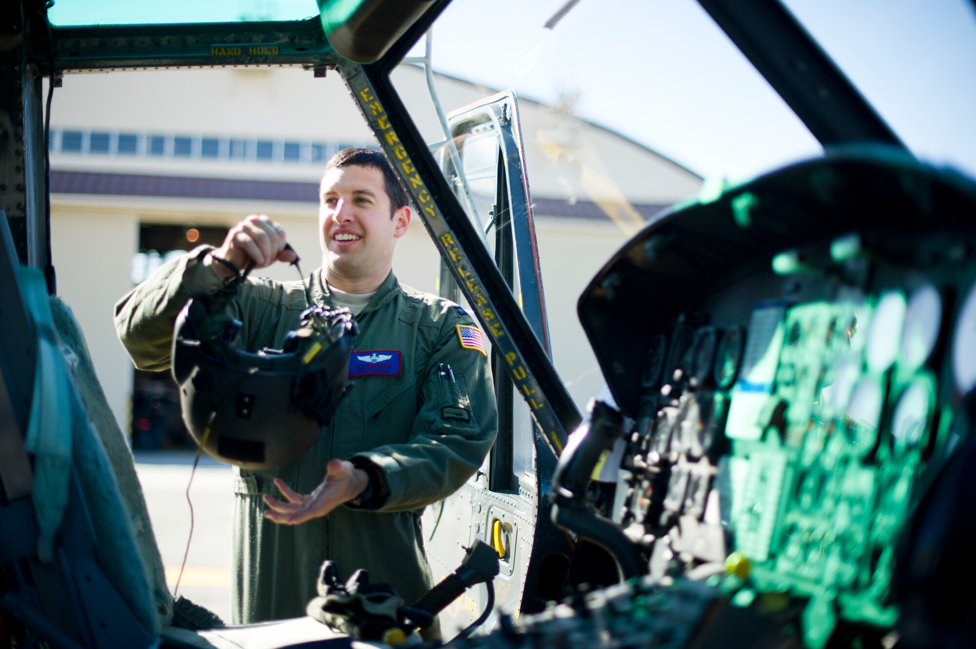 YOKOTA AIR BASE, Japan -- Capt. Terry Martin, 459th Airlift Squadron pilot, goes through pre-flight checks on a UH-1N Huey helicopter during fly-away security team training at Yokota Air Base, Japan, Feb. 25, 2013. During contingencies, FAST members, embed with the aircrew and travel with Yokota aircraft providing protection in potentially dangerous areas. (U.S. Air Force photo by Staff Sgt. Stacy Moless)