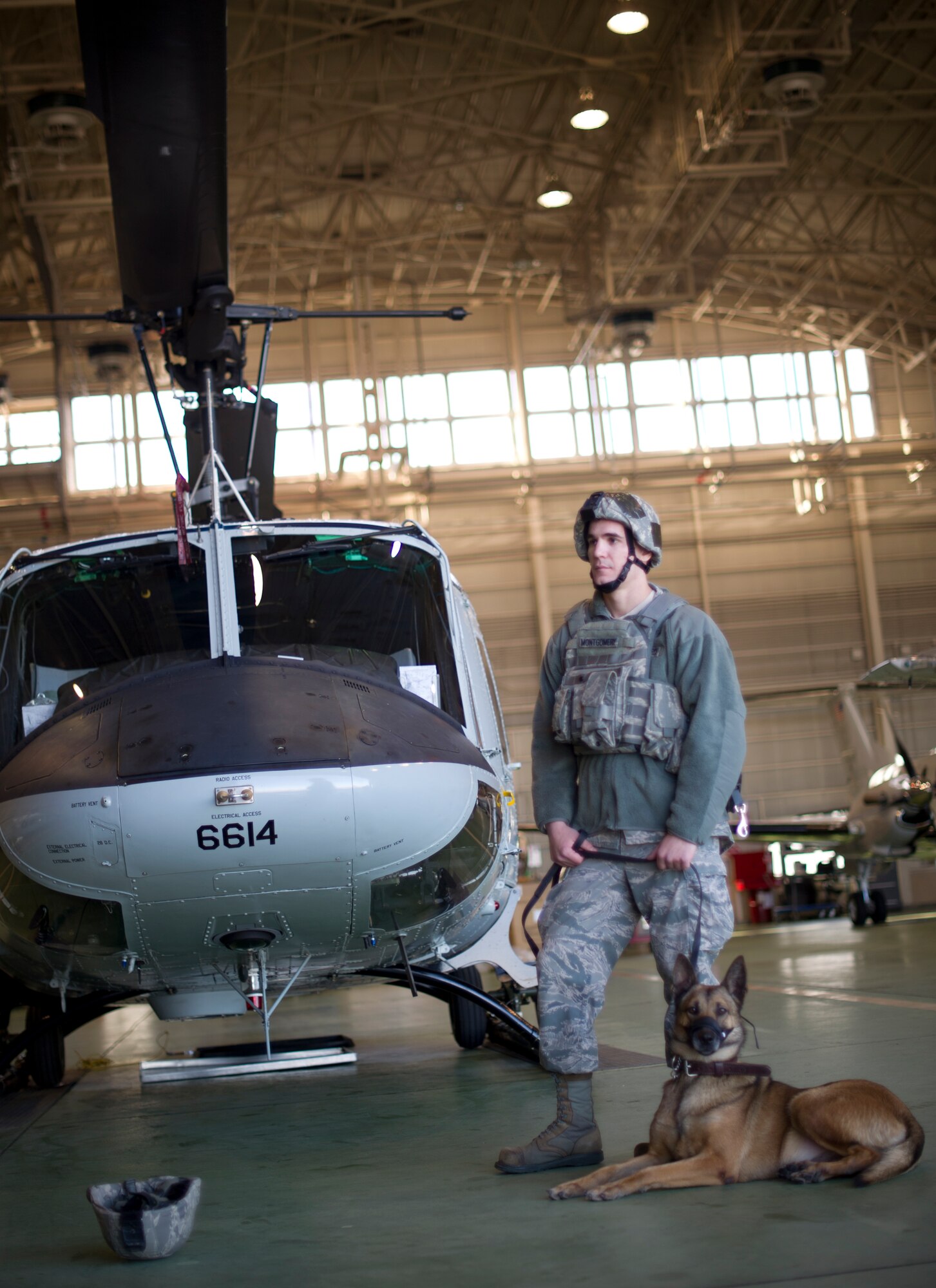 YOKOTA AIR BASE, Japan -- Senior Airman Andrew Montgomery, 374th Security Forces Squadron military working dog handler, stands ready to begin a fly-away security team training at Yokota Air Base, Japan, Feb. 25, 2013. During contingencies FAST members, embed with the aircrew and travel with Yokota aircraft providing protection against potential threats in potentially dangerous areas protecting all crew members and the aircraft. (U.S. Air Force photo by Staff Sgt. Stacy Moless)