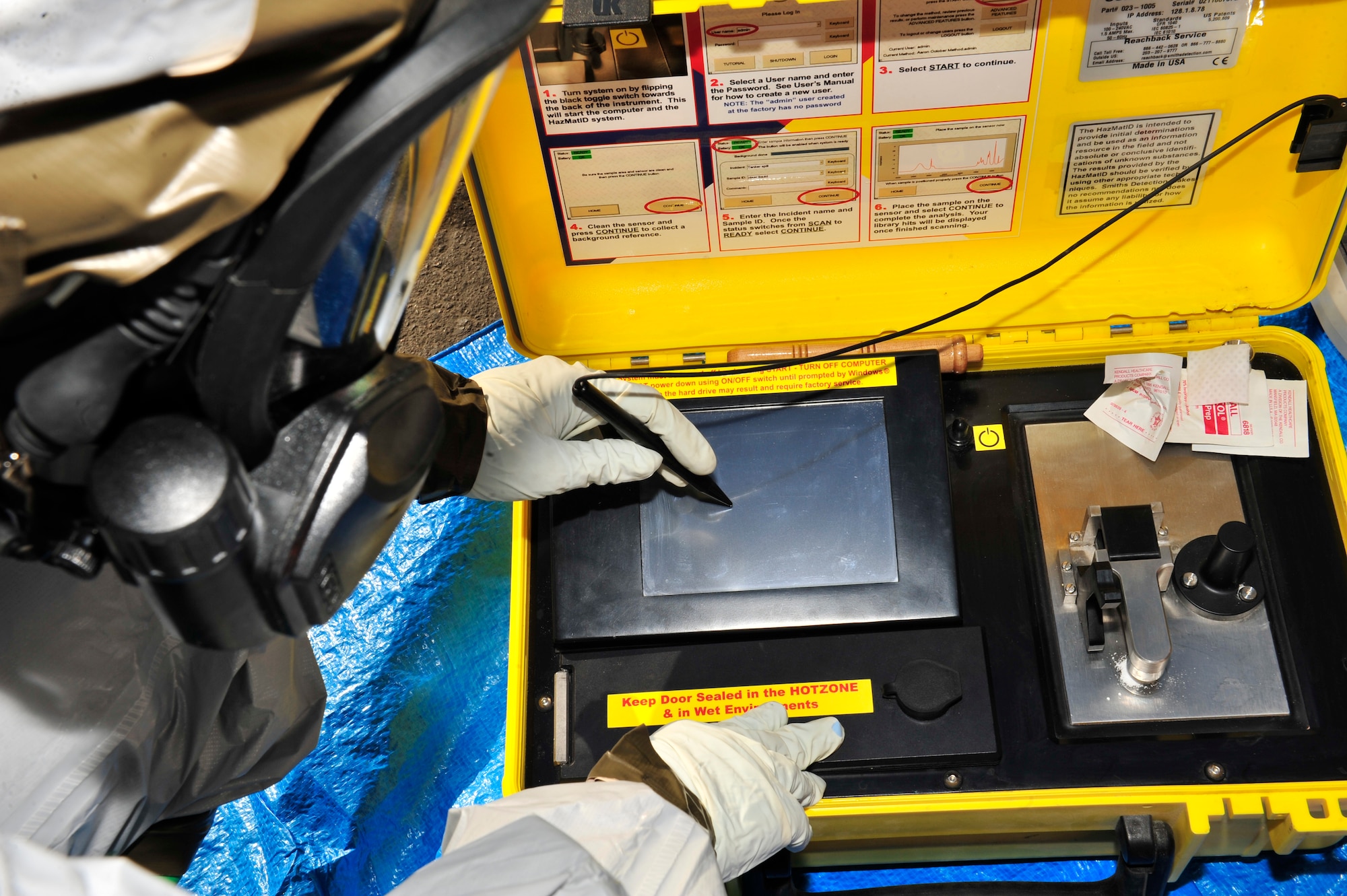 U.S. Air Force Senior Airman Jacob Allen, 380th Expeditionary Civil Engineer Squadron emergency management journeyman, uses a Hazardous Material Identifier to test suspicious materials during a chemical, biological, radiological, nuclear and explosives (CBRNE) response exercise at an undisclosed location in Southwest Asia Feb. 15, 2013. The emergency management office participates in monthly exercises to ensure they are ready in the case of a real-world scenario. Allen is deployed from Eielson Air Force Base, Alaska. (U.S. Air Force photo by Tech. Sgt. Christina M. Styer/Released)