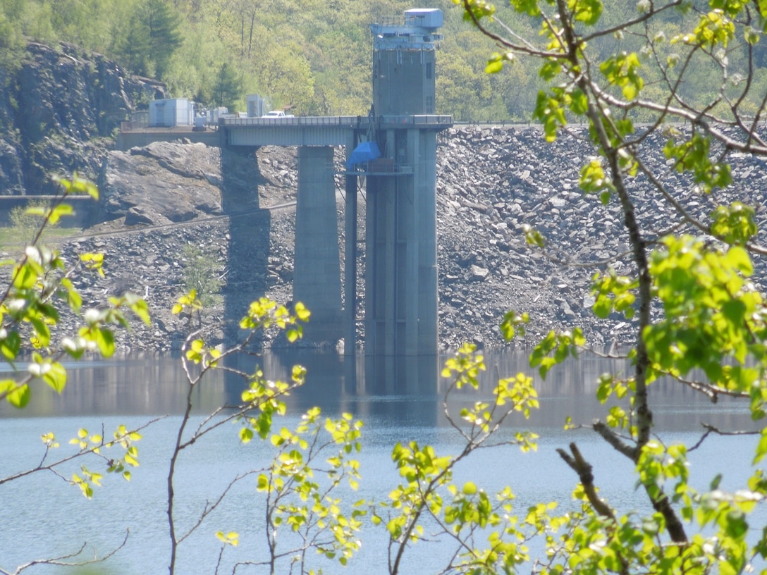 The gatehouse at Colebrook Dam, Riverton, Conn., which is located on the Farmington River, and is a part of a network of flood control dams on tributaries of the Connecticut River. Completed in 1969 at a cost of $14.3 million, the amount of water stored at Colebrook River Lake can fluctuate substantially. The pool, used for both water supply and fishery habitat, normally covers an area of about 750 acres. Colebrook River Lake can store up to 16.56 billion gallons of water for flood risk management purposes.