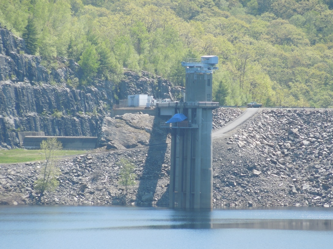 The gatehouse at Colebrook Dam, Riverton, Conn., which is located on the Farmington River, and is a part of a network of flood control dams on tributaries of the Connecticut River. Completed in 1969 at a cost of $14.3 million, the amount of water stored at Colebrook River Lake can fluctuate substantially. The pool, used for both water supply and fishery habitat, normally covers an area of about 750 acres. Colebrook River Lake can store up to 16.56 billion gallons of water for flood risk management purposes.