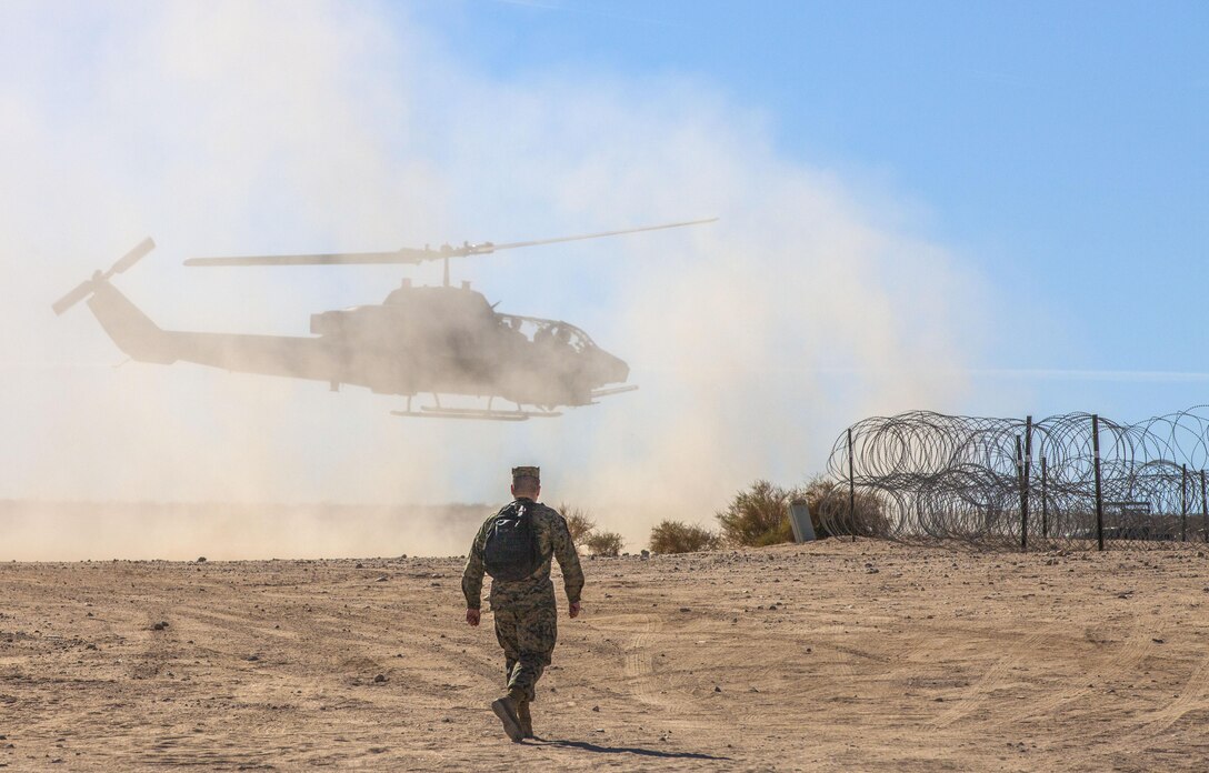 AH-1 Cobras of Marine Light Attack Helicopter Squadron 167 return from a close air support exercise as part of the first Integrated Training Exercise at Camp Wilson, Twentynine Palms, Calif., Jan. 19, 2013. The ITX is the first of a new series of exercises designed to replace Enhanced Mojave Viper as the Marine Corps' standard pre-deployment training evolution.