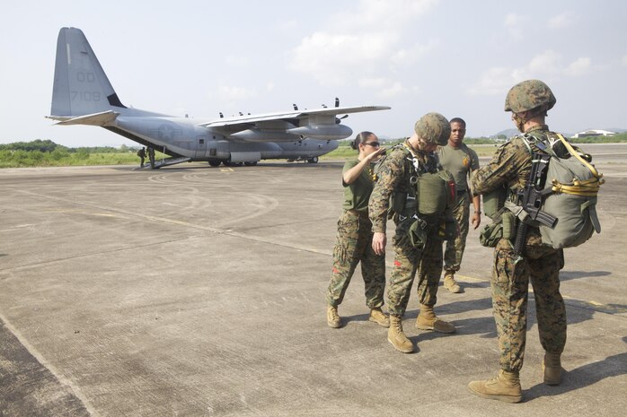 Marines from Combat Logistics Regiment 3 prepare to conduct a bilateral air delivery jump alongside Royal Thai Marines Feb. 20 during exercise Cobra Gold 2013 at Utapao Royal Thai Navy Air Field, Rayong province, Kingdom of Thailand. The jump increased the Thai and U.S. Marines’ proficiency and ability to conduct bilateral operations. CLR-3 is a part of 3rd Marine Logistics Group, III Marine Expeditionary Force. CG 13, in its 32nd iteration, is the largest multinational exercise in the Asia-Pacific region that demonstrates commitment to building interoperability with participating nations and to supporting peace and stability in the region.


