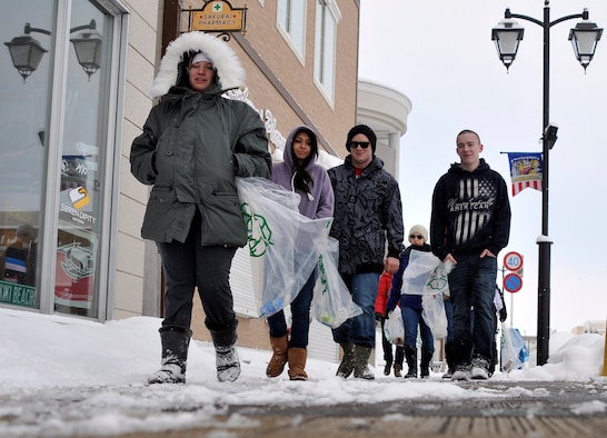Seventy-two service members from Misawa Air Base, Japan, brave the winter cold to pick up trash in public areas during a citywide cleanup event in Misawa City Feb. 23, 2013. The event was created to help beautify the off-base community and reinforce host nation partnerships. (U.S. Air Force photo by Tech. Sgt. Phillip Butterfield)