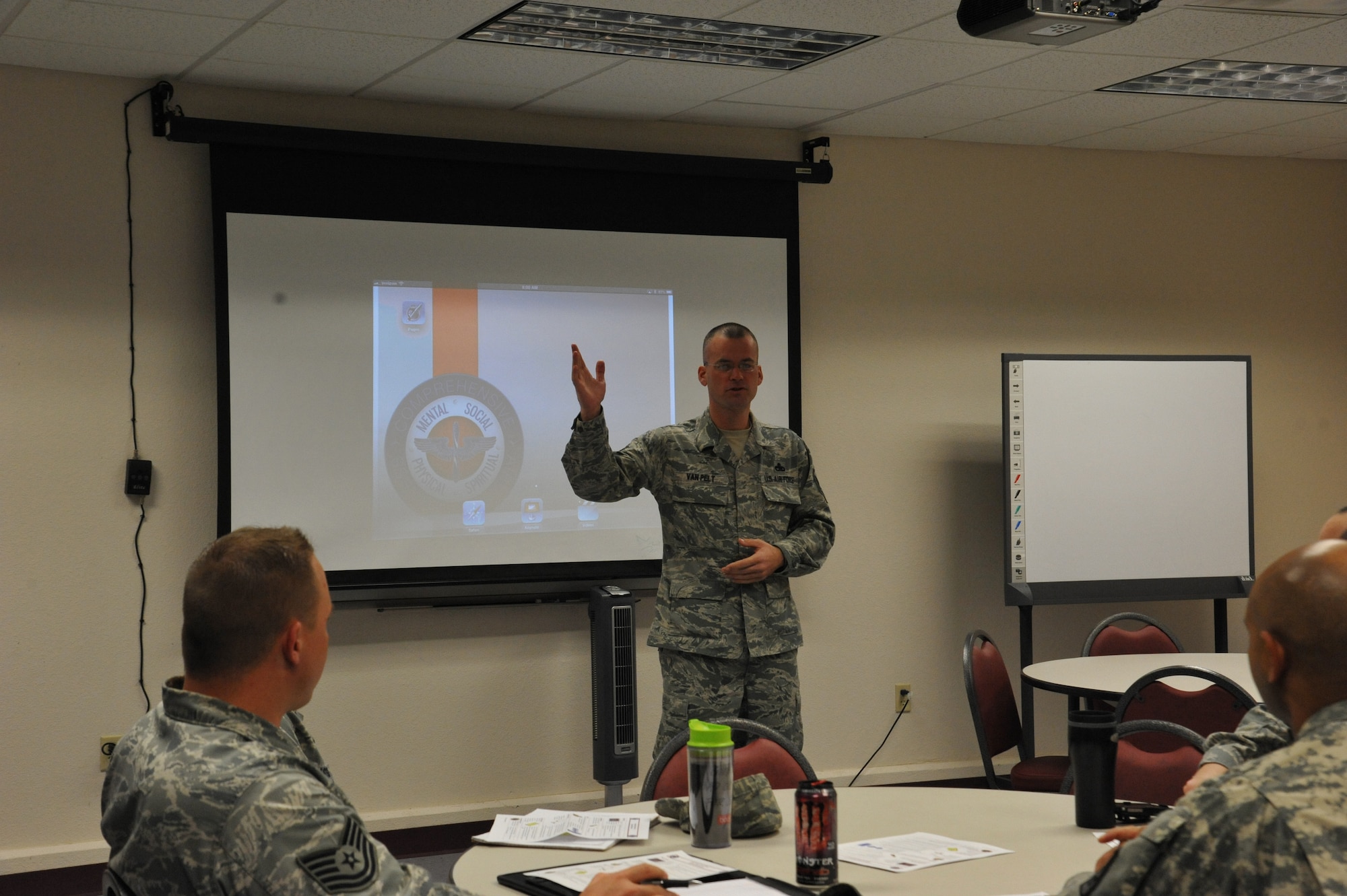 Master Sgt. John Van Pelt, one of the Master Resiliency Trainers, kicks of the first training session for Comprehensive Airman Fitness (CAF) training imitative on Feb. 20 at the Airman & Family Readiness Center. (U.S. Air Force Photo/Kimberly Parker).