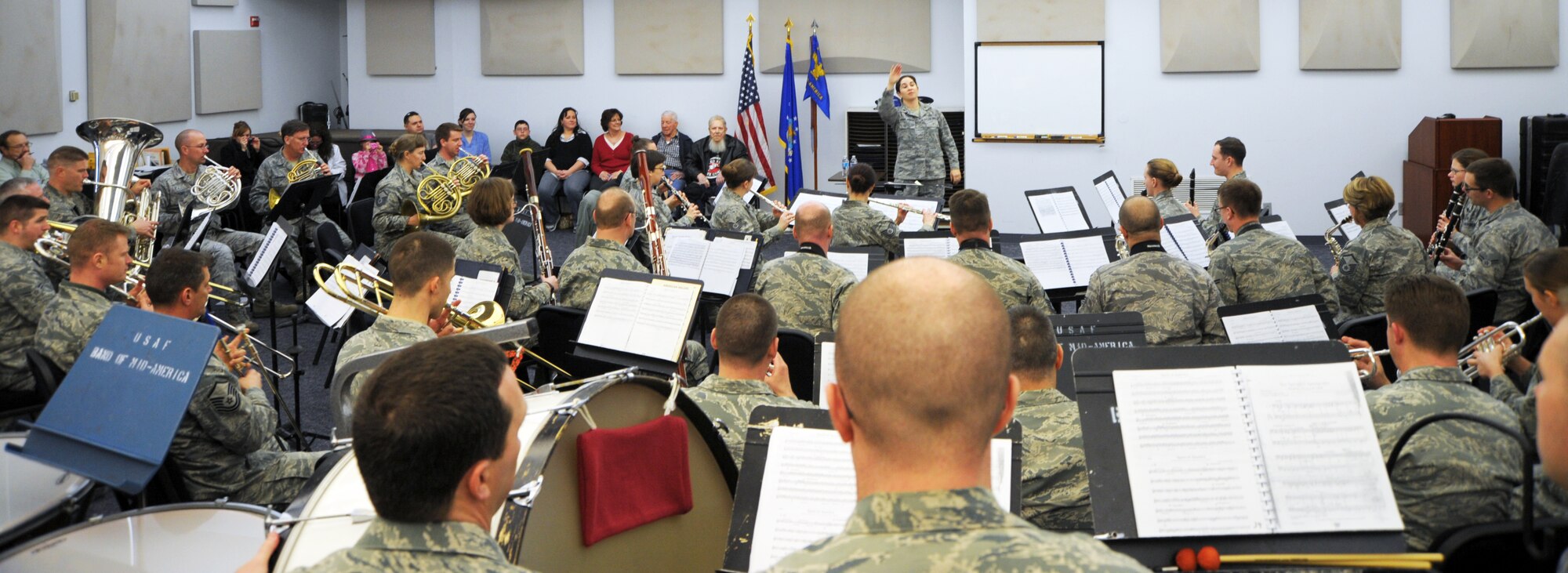 The United States Air Force Band of Mid-America plays the Marine Corps Hymn for terminally ill Marine Corps veteran’s Robert Geggie Feb. 25 on Scott Air Force Base, Ill. The performance was a last wish come true thanks to the band and Hospice Dreams. (U.S. Air Force photo/ Staff Sgt. Stephenie Wade)