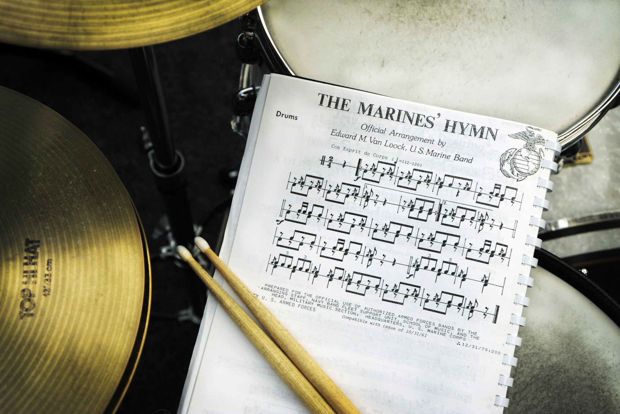 The United States Air Force Band of Mid-America sheet music of the Marine Corps sits on a set of drums in the band hall on Scott Air Force Base, Ill. (U.S. Air Force Illistrative photo/ Staff Sgt. Stpehenie Wade)