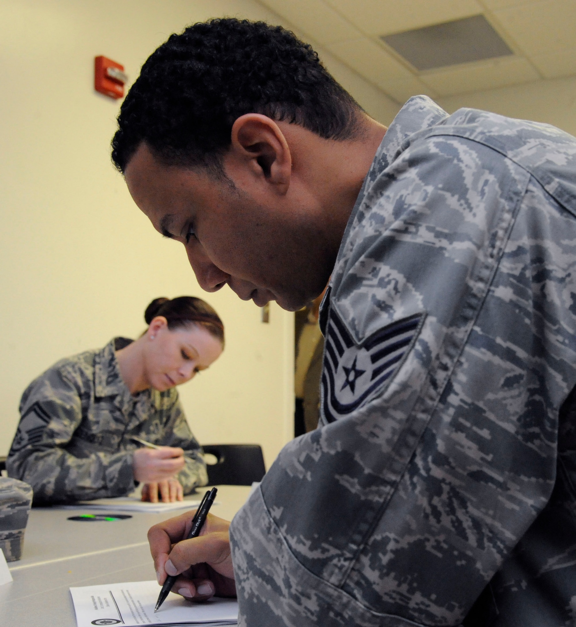 Tech. Sgt. Remy Voisin, 2nd Maintenance Squadron, writes his experience of resilience during Resilience Training Assistant training on Barksdale Air Force Base, La., Feb. 26. The class teaches various ways Airmen can be resilient: physical, mental, spiritual and social. Airmen in this class will go back to their units as RTAs and provide other Airmen the tools to balance out all forms of resiliency. (U.S. Air Force photo/Airman 1st Class Andrew Moua)