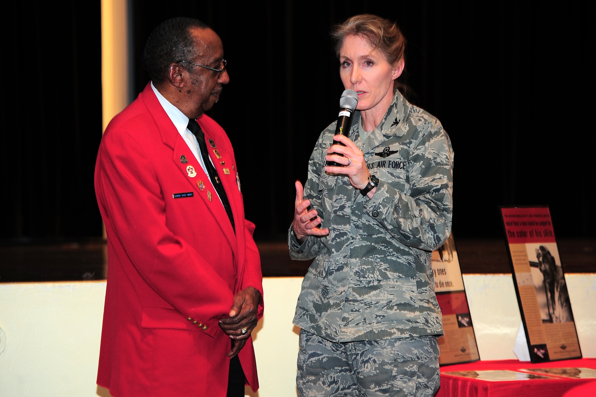 U.S. Air Force Col. Jeannie Leavitt, 4th Fighter Wing commander, thanks Leonard Hunter, member of the local Chapter of the Tuskegee Airman Inc., for sharing his stories during the 4th FW Leadership Lecture Series: Perseverance through Adversity, on Seymour Johnson Air Force Base, N.C., Feb. 22, 2013. Hunter’s lecture was the first of a series hosted by Leavitt, to give Airmen an opportunity to learn from our country’s leaders and warriors. (U.S. Air Force photo/Airman 1st Class Aubrey White/Released)
