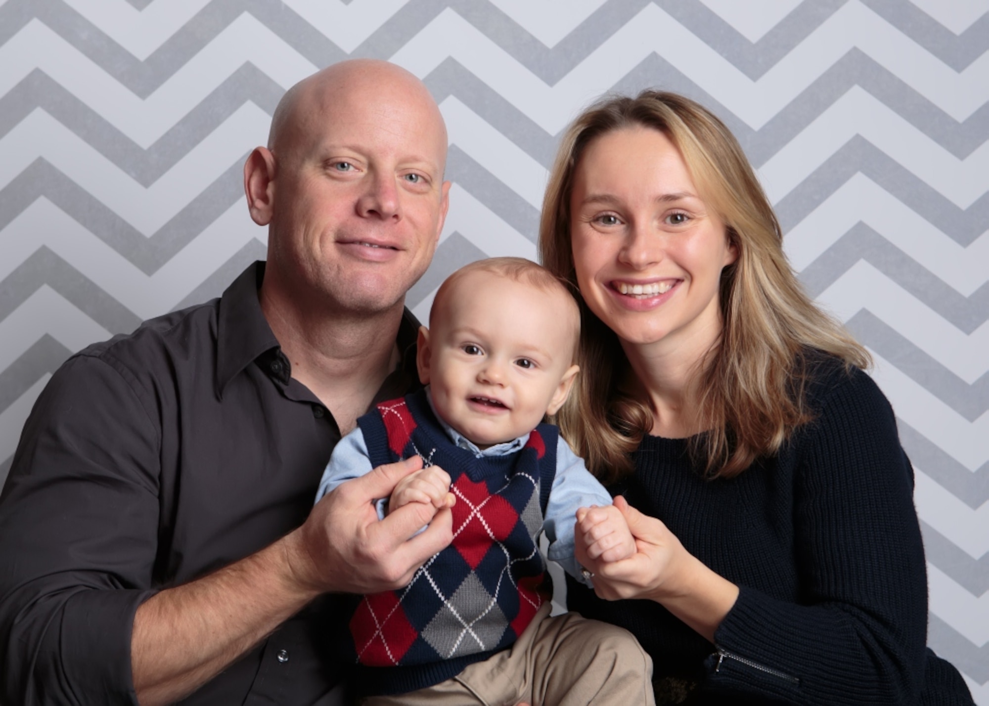 Danielle Tenconi (right), as seen with her husband, U.S. Army Capt. Todd Turner and their 1-year-old son Wyatt, was recently named the Armed Forces Insurance Military Spouse of the Year for Joint Base Langley-Eustis, Va., and is now in the running to earn top honors at the Army-wide level. Tenconi is active in the military spouse community, having served as a Family Readiness group leader, and continues to be a leader in supporting military spouses. (Courtesy photo)

