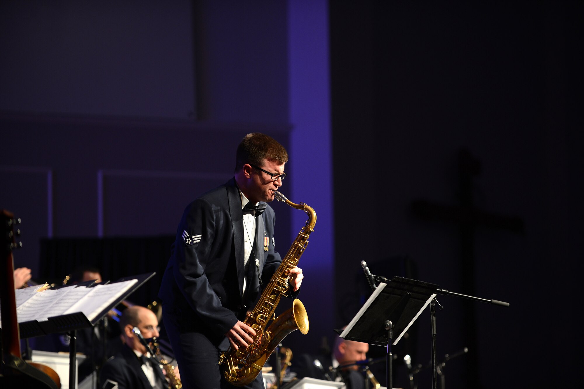 Senior Airman Steve Rozek, Air Force Rhythm in Blue operations representative and saxophonist, performs a solo selection with the accompaniment of the band at Alice Drive Baptist Church, Sumter, S.C., Feb. 19, 2013. The ensemble is comprised of 15 musicians, some well versed in multiple instruments, who perform jazz, blues and funk music. (U.S. Air Force photo by Airman 1st Class Daniel Blackwell/Released)