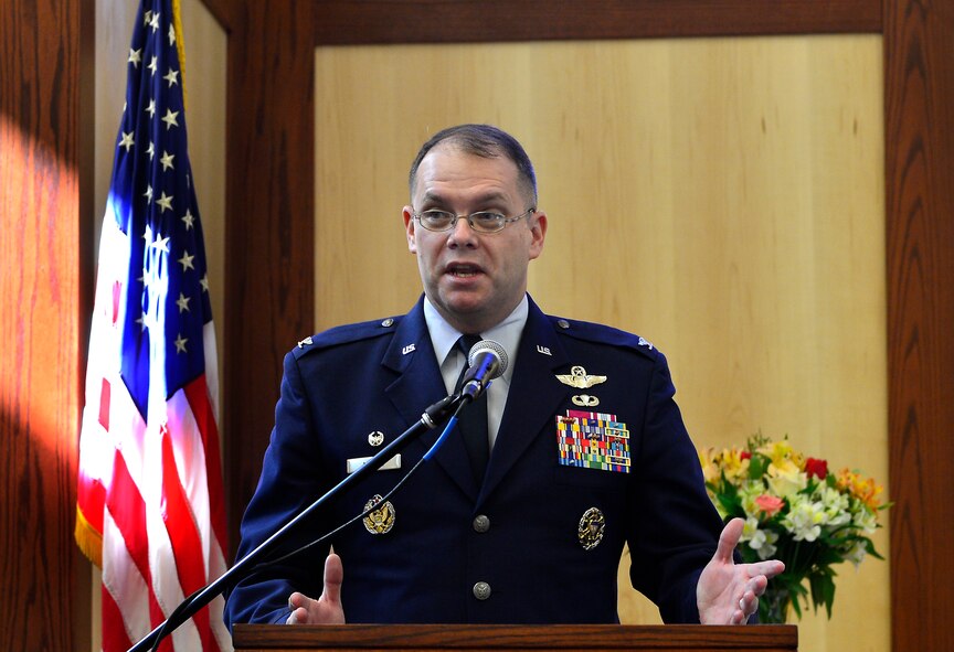 Col. Rick Moore, 436th Airlift Wing commander, speaks at the ribbon cutting ceremony for the new base chapel Feb. 25, 2013, at Dover Air Force Base, Del. The new chapel provides a place where the members of Team Dover can come together as a community, spiritually. (U.S. Air Force photo/David Tucker)