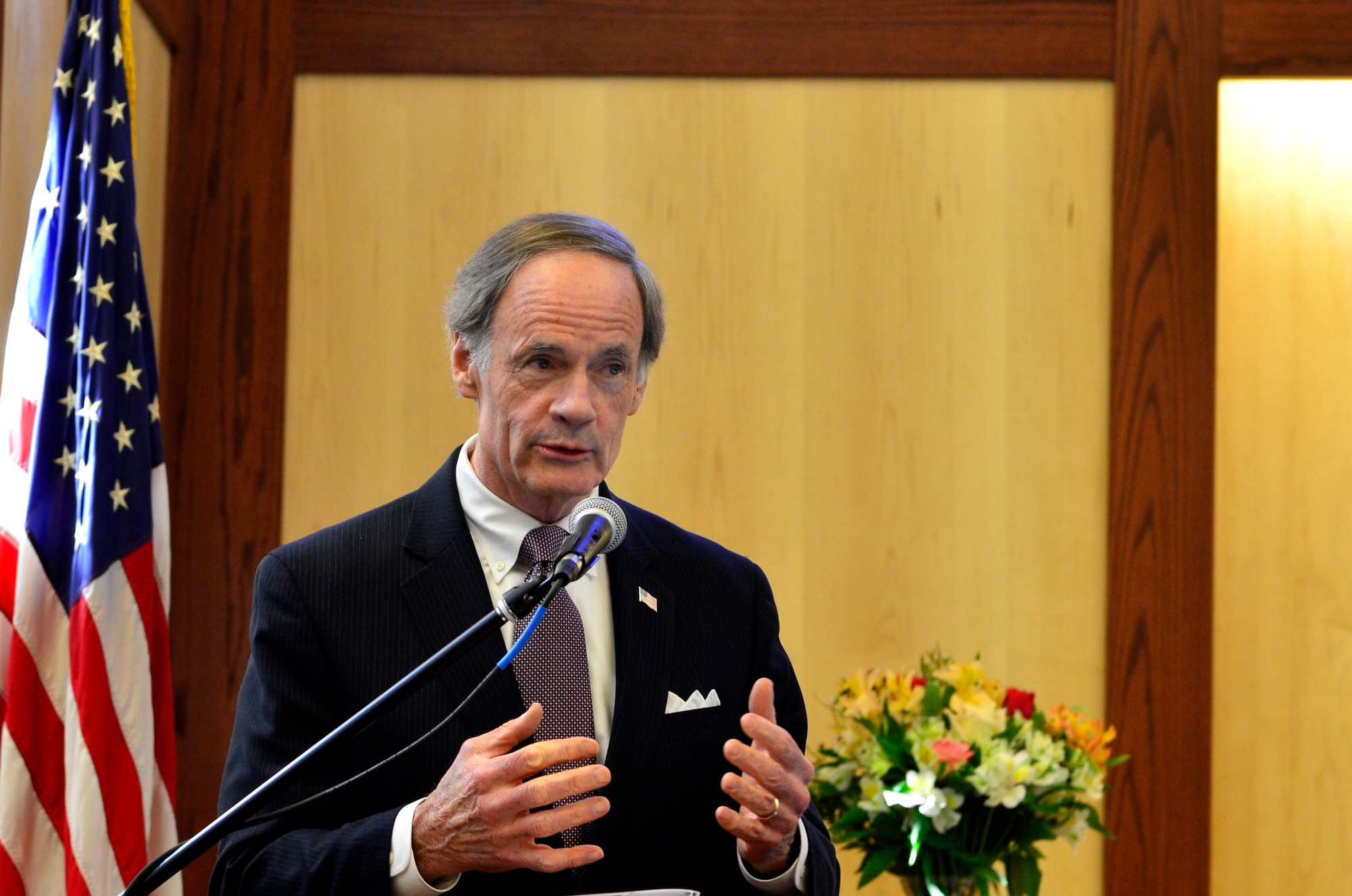 U.S. Sen. Tom Carper of Delaware, speaks at the ribbon cutting ceremony for the new base chapel Feb. 25, 2013, at Dover Air Force Base, Del. Carper stated the new chapel is very special and serves a special purpose for the country. (U.S. Air Force photo/David Tucker)