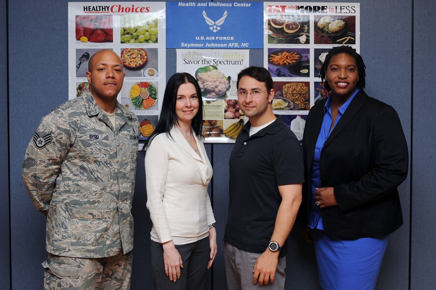 The Health and Wellness Center staff pose for a group photo on Seymour Johnson Air Force Base, N.C., Feb. 22, 2013. The HAWC is a multi-disciplinary team dedicated to enhancing Air Force mission readiness and providing guidance and education to the Team Seymour community. (U.S. Air Force photo/Airman 1st Class John Nieves Camacho/Released)