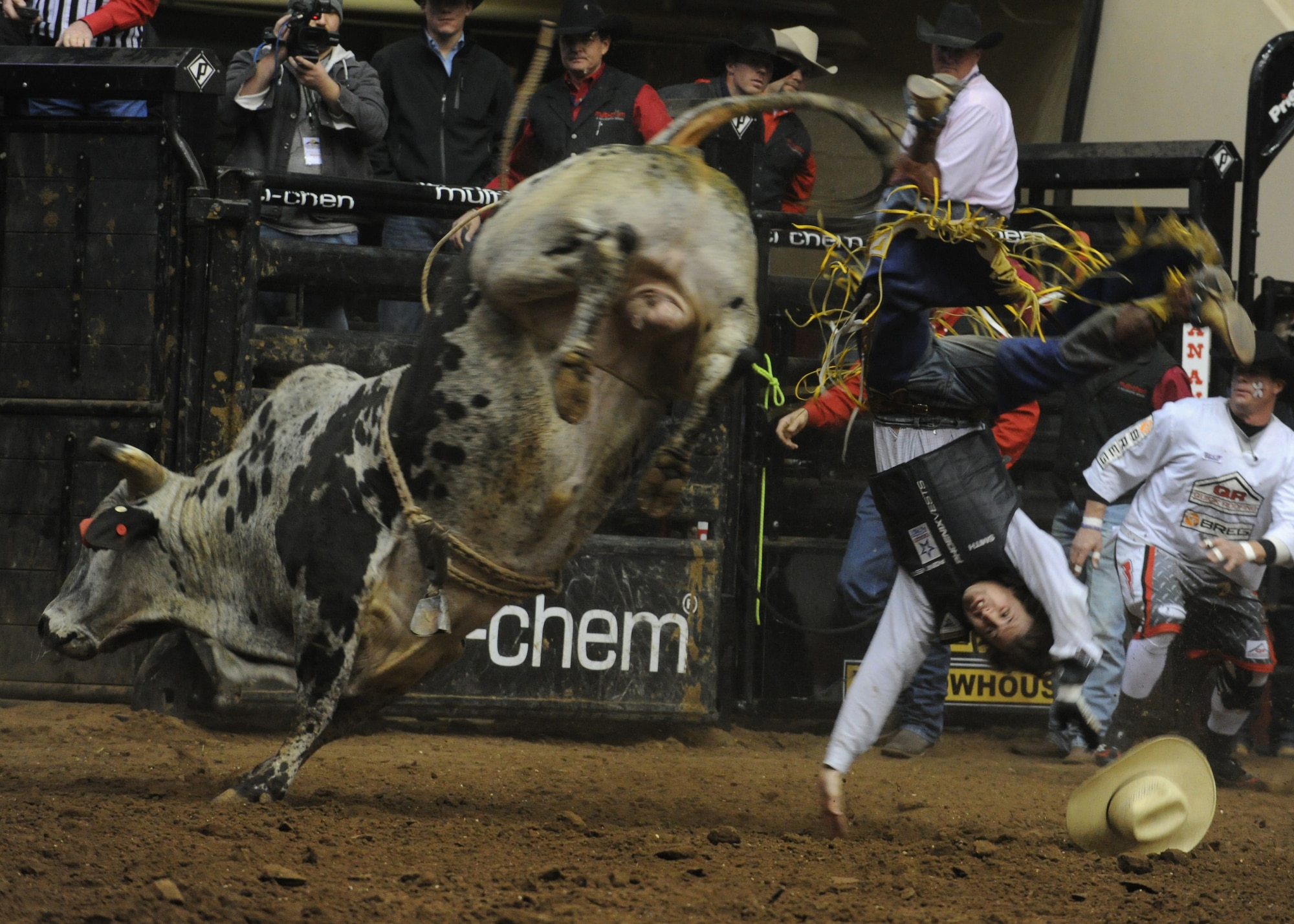 SAN ANGELO, Texas – A competitor in the San Angelo Stock Show and Rodeo is thrown from a bull at the Foster Communication Coliseum, Feb. 20. There were several other events that night including calf roping, bareback horse riding, girl’s barrel racing and more. (U.S. Air Force photo/ Staff Sgt. Laura McFalane)