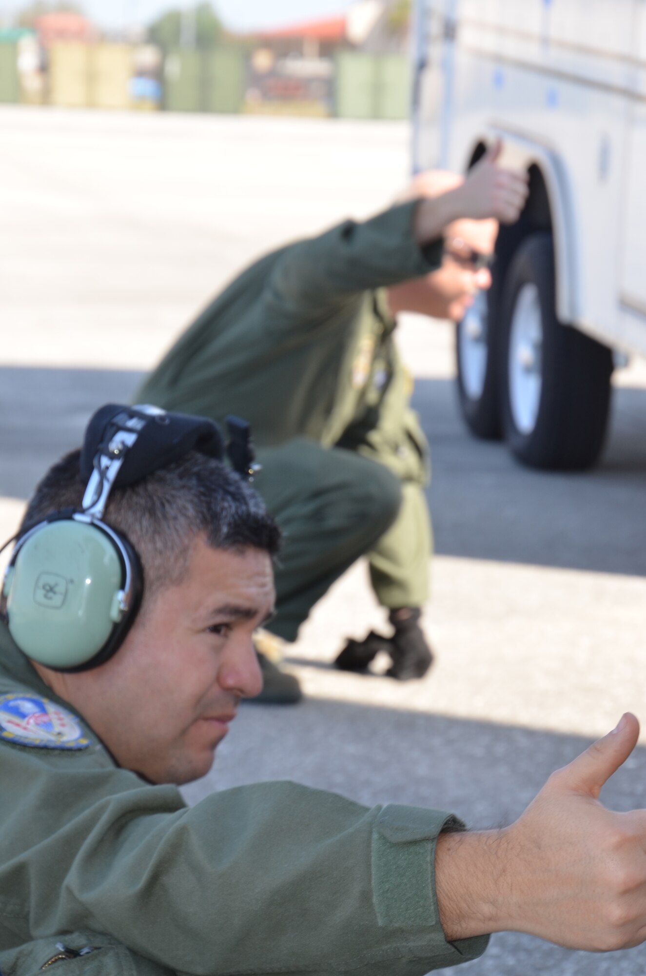 SrA. Yebel Martinez, left, and MSgt. Shawn Harris, 337th Airlift Squadron loadmasters, assist the FBI with loading a truck aboard a Westover Air Reserve Base, Mass., C-5 Feb. 23, during Patriot Sands 2013. (US Air Force photo/MSgt. Andrew Biscoe)