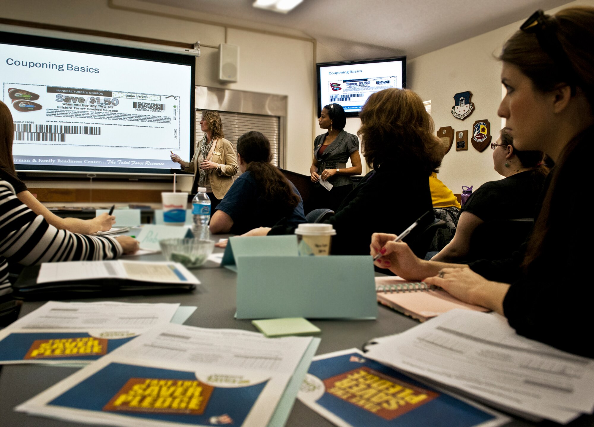 Mary Davis, of the Airman and Family Readiness Center, teaches a class called Couponing 101 during Military Saves Week at Eglin Air Force Base, Fla., Jan. 26.  Military Saves Week featured workshops geared to help military members and their families save money.  People can also sign up to “pledge to save during the week and be eligible for an IPad drawing Feb. 4.  For more information on the pledge, go to www.militarysaves.org.  (U.S. Air Force photo/Samuel King Jr.)