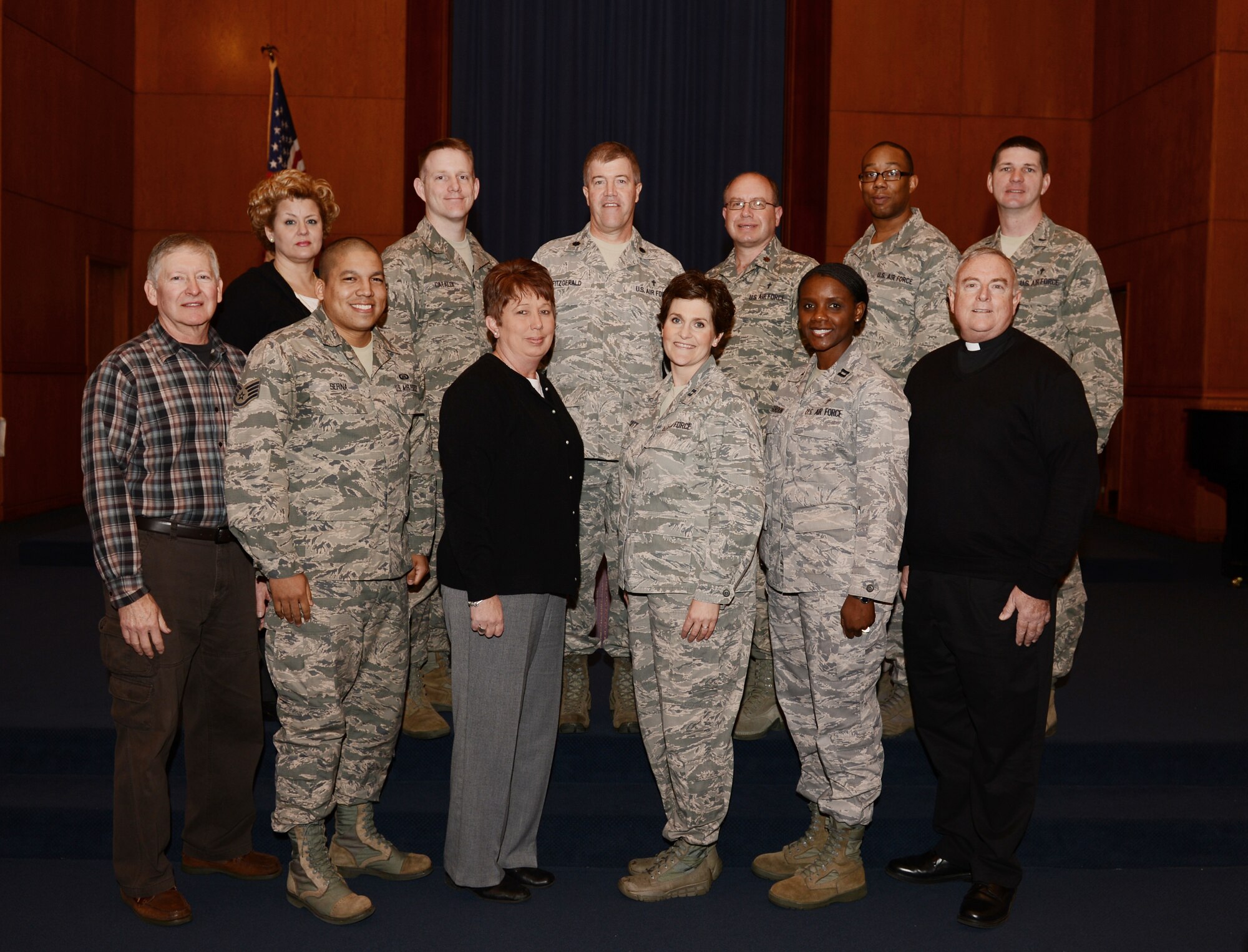 The 20th Fighter Wing Palmetto Chapel staff gathers for a group photo, Shaw Air Force Base, S.C., Feb. 19, 2013. Some members are missing due to deployments or temporary duty. The Palmetto Chapel won the Charles I. Carpenter Award for 2012 at the Air Combat Command level. The award is given for outstanding wing mission impact, management, training, ministries and programs offered. (U.S. Air Force photo by Senior Airman Tabatha Zarrella/Released)