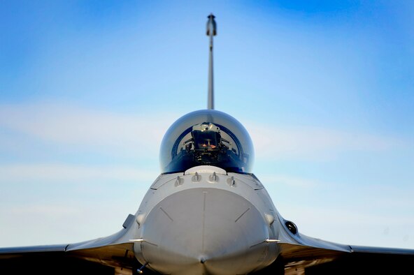 A 79th Fighter Squadron ‘Tigers’ pilot gets situated in the cockpit of his F-16 Fighting Falcon prior to takeoff during day one of Red Flag 13-3, Feb. 25, 2013. The ‘Tigers’ launched a total of 16 times during day and nighttime missions to kick off the exercise. The unit has approximately 15 F-16 Fighting Falcons on the ground at Nellis AFB and 35 pilots slated to fly throughout the three-week long exercise. (U.S. Air Force photo by Staff Sgt. Kenny Holston/Released) 