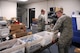 Airman 1st Class John Loch and Tech. Sgt. Brandon Boos collect and sort information technology equipment being turned in by the 178th Figher Wing Communications Flight, Springfield Ohio, Feb. 3. Innesential equiipment is bing turned in to DRMO.